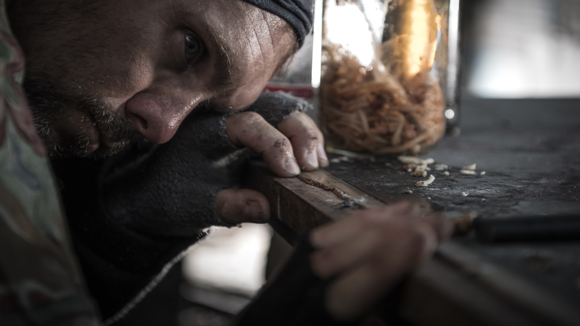 A distressed homeless man clutches a table near spilled food, highlighting the devastating impact of substance abuse. This powerful visual ties into the broader discussion around addiction and questions like "is meth an opioid." A distressed homeless man clutches a table near spilled food, highlighting the devastating impact of substance abuse. This powerful visual ties into the broader discussion around addiction and questions like "is meth an opioid."