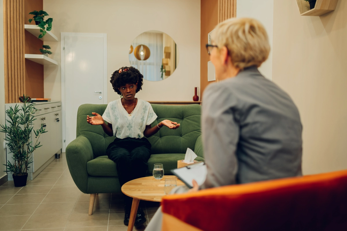 CBT: Concerned woman speaking to her doctor