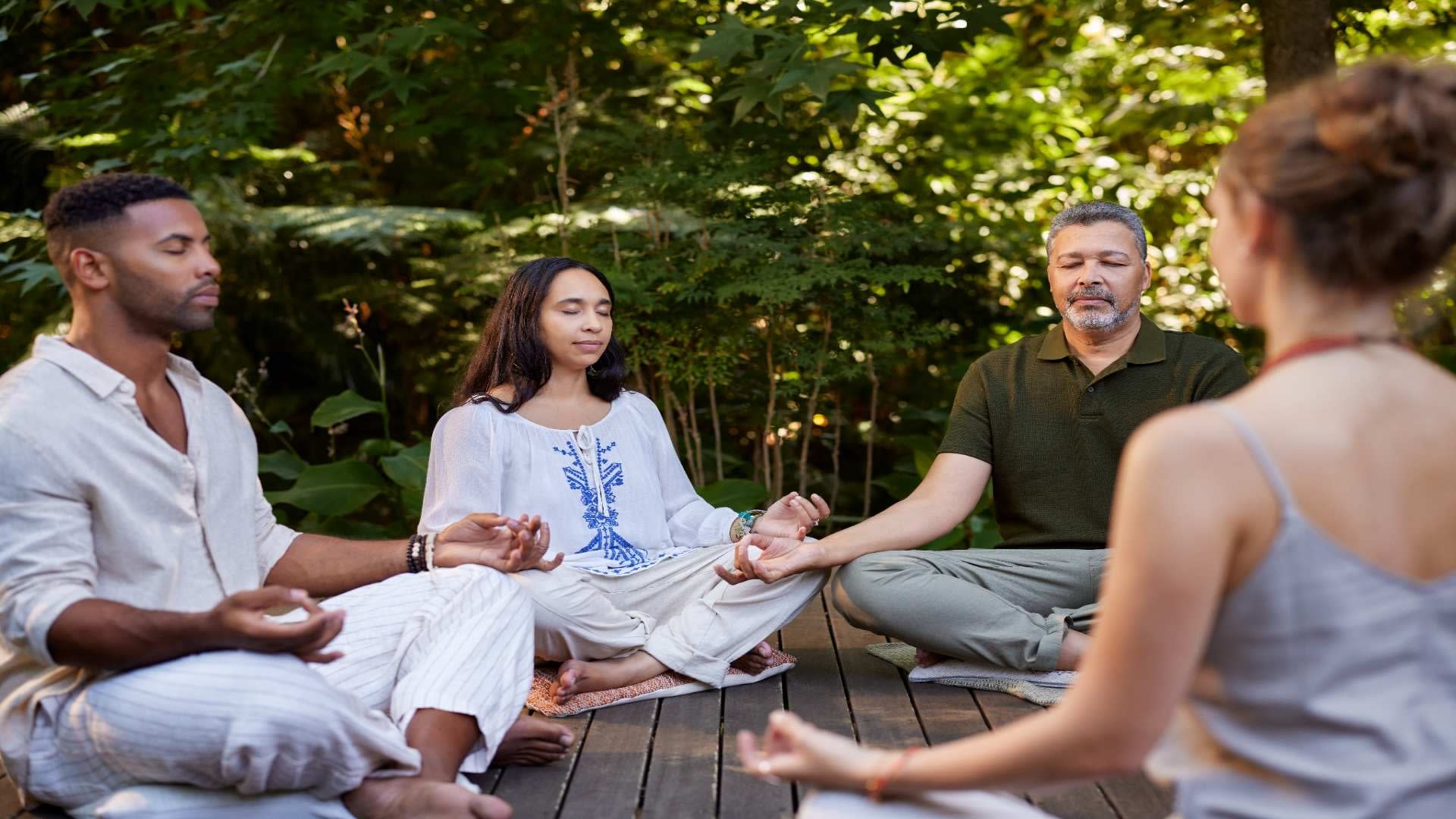 yoga-class-meditating-in-the-middle-of-nature-2025-05-07-00-03-47-utc