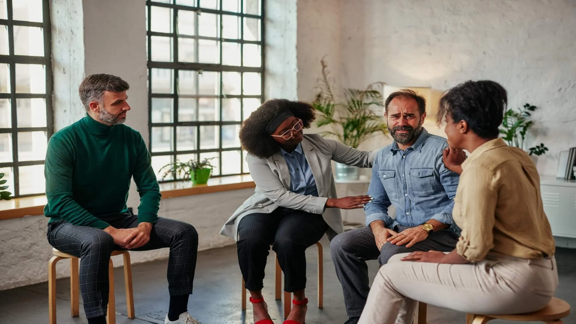 support-group-patients-comforting-man-at-therapy-s-2024-10-17-23-53-02-utc (1)