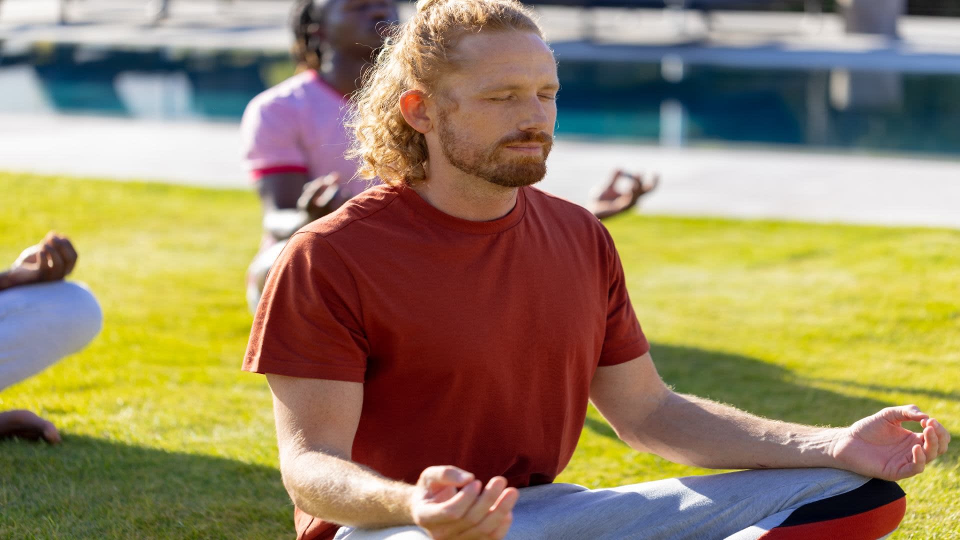 group-of-diverse-friends-doing-yoga-and-meditating-2025-04-04-05-16-10-utc