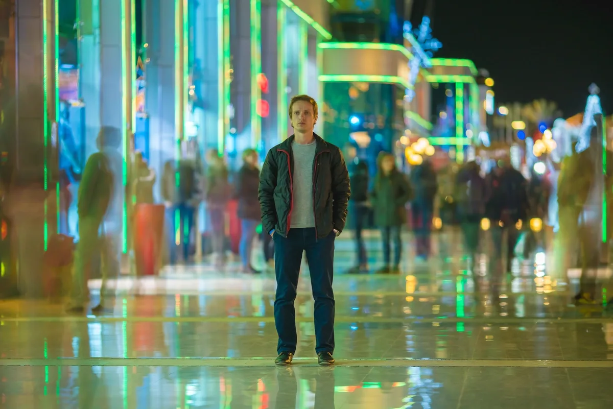 Man Suffering From Seasonal Affective Disorder Standing in the Street