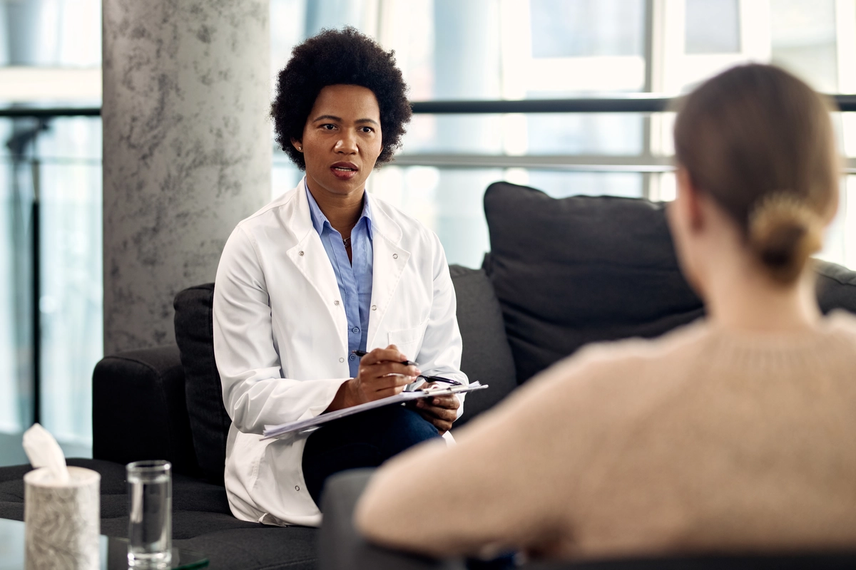 Drug Detox: Doctor speaking to a woman
