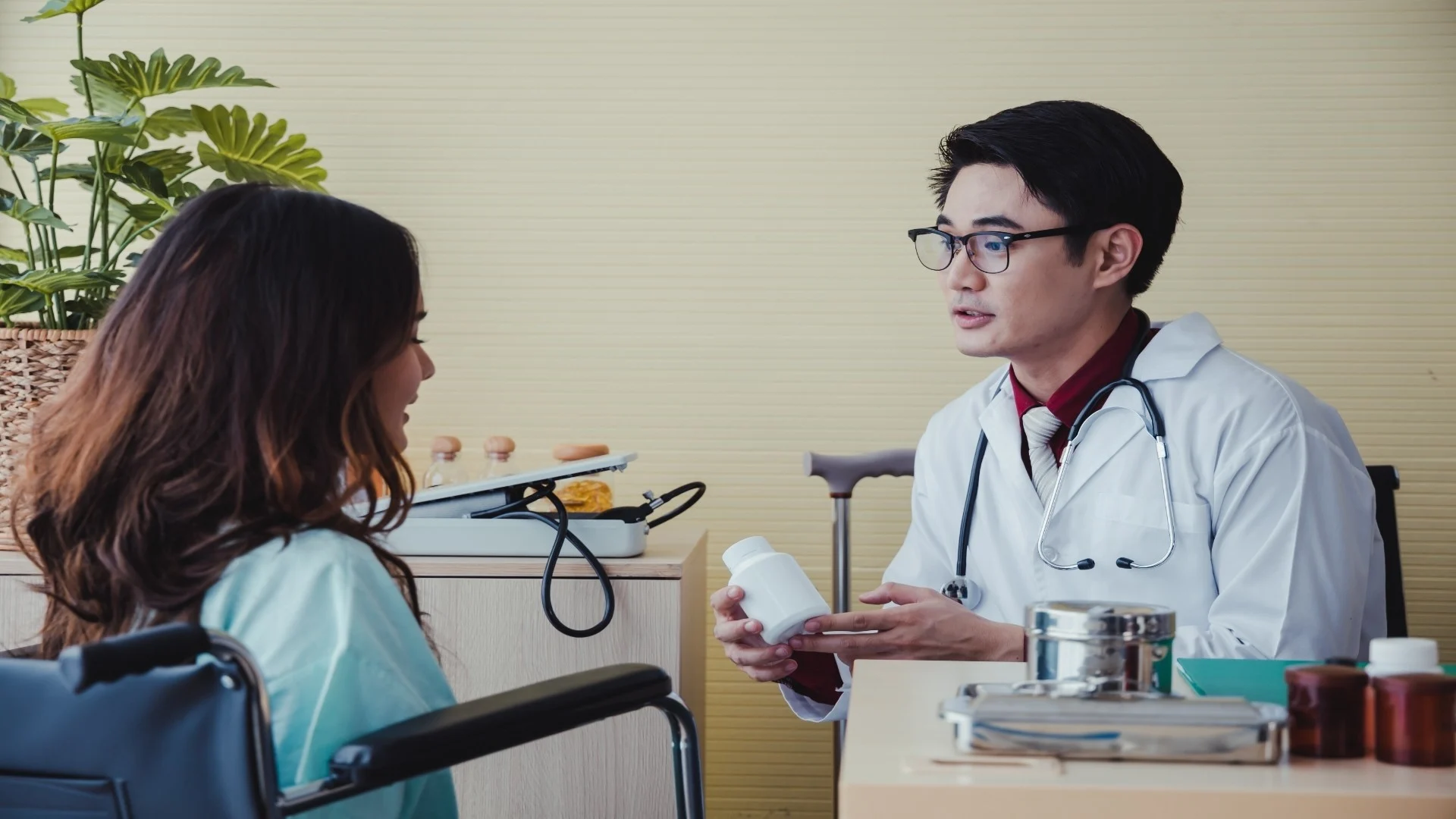 doctor-is-giving-medicine-to-a-female-patient-2024-10-21-12-50-00-utc