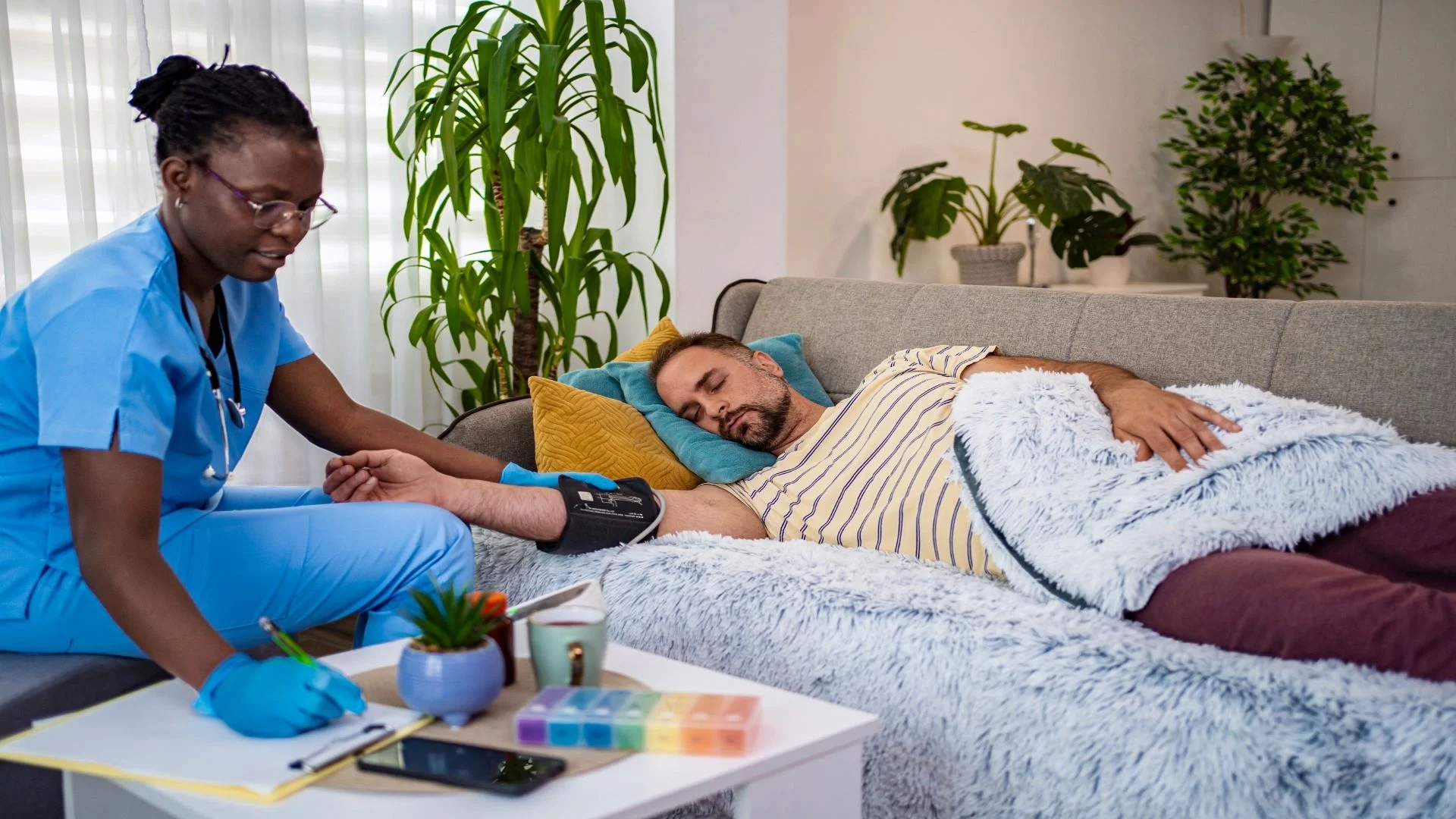 caring-healthcare-provider-assists-patient-at-home-2025-07-05-05-38-01-utc