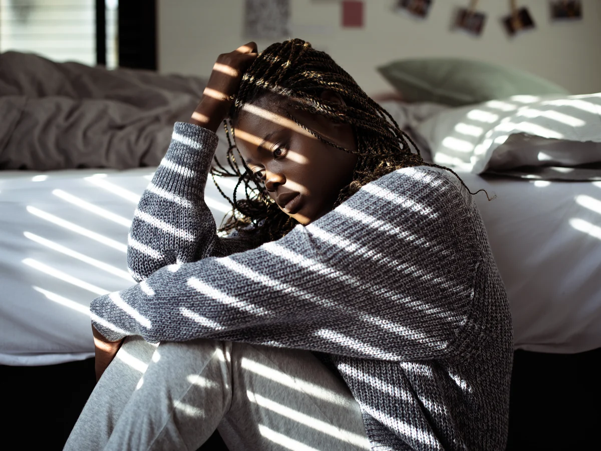Bipolar Disorder - Woman Sitting in Blinds Shade