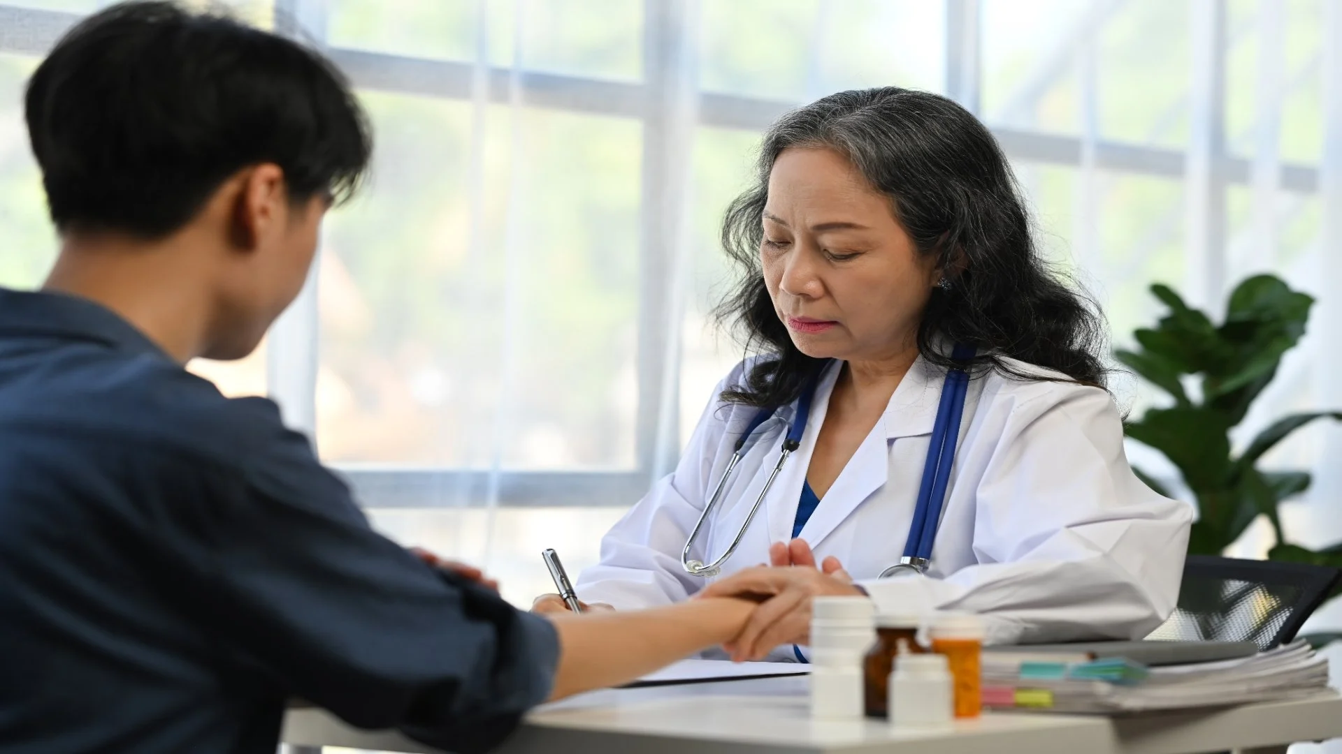 middle-age-female-doctor-taking-a-female-patient-p-2024-11-29-00-55-21-utc