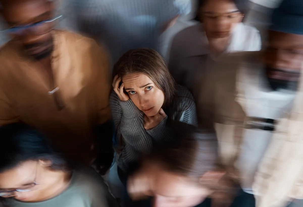 Meth Addiction: Woman nervous in a moving crowd