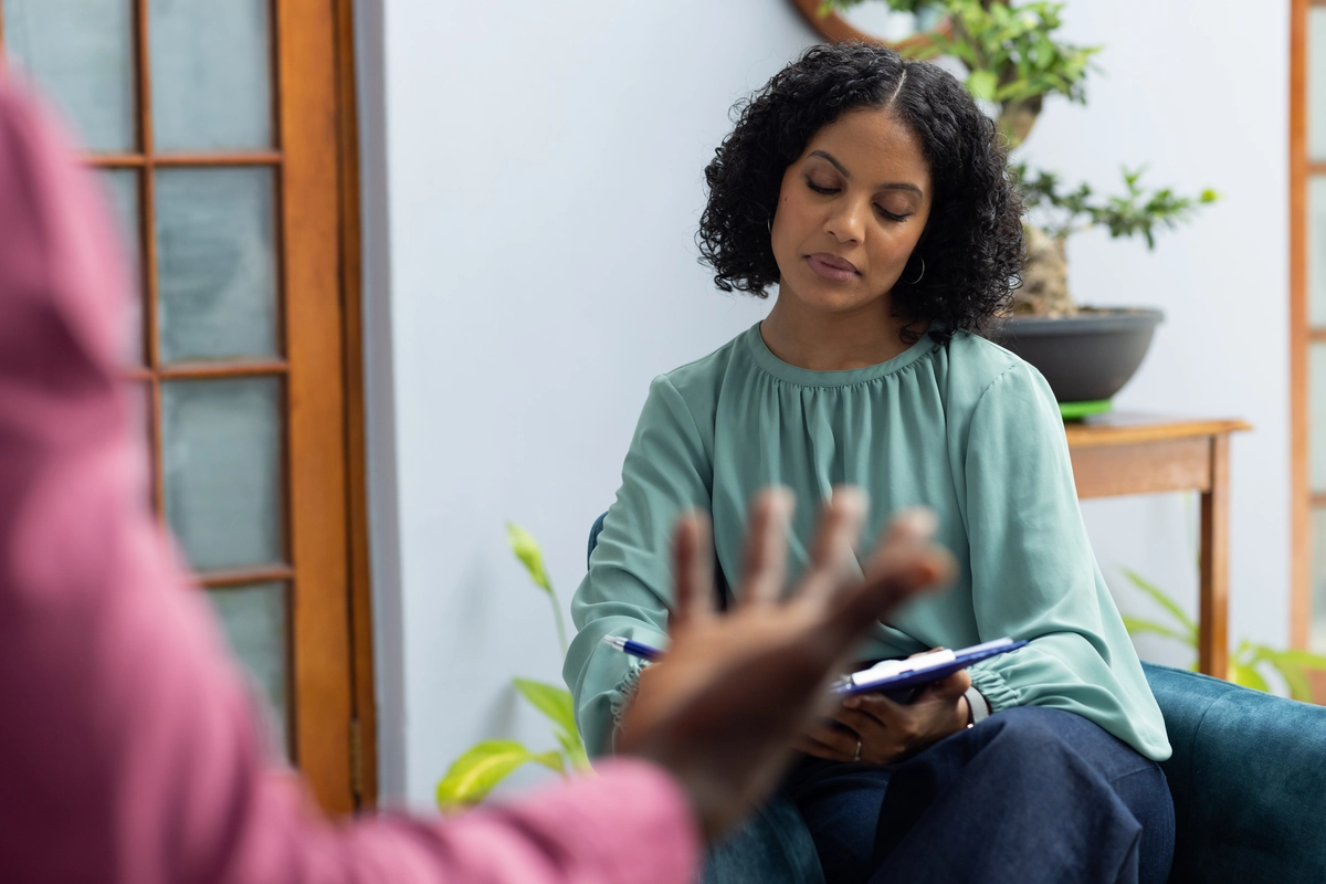 CBT: Therapist listening to a patient