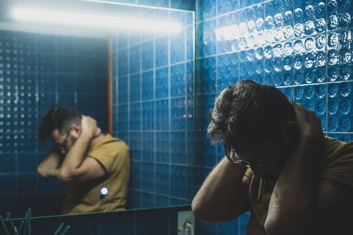 Schizoaffective Disorder Affecting Man in Bathroom Schizoaffective Disorder Affecting Man in Bathroom