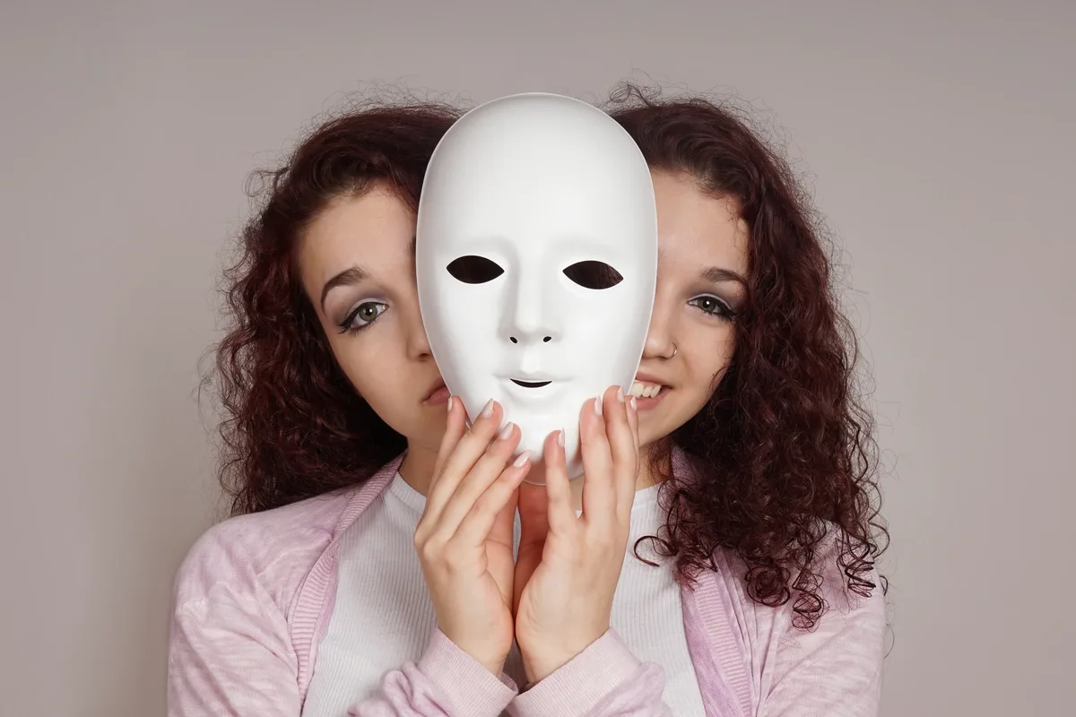 Bipolar Disorder - Girl with Mask on Happy and Sad