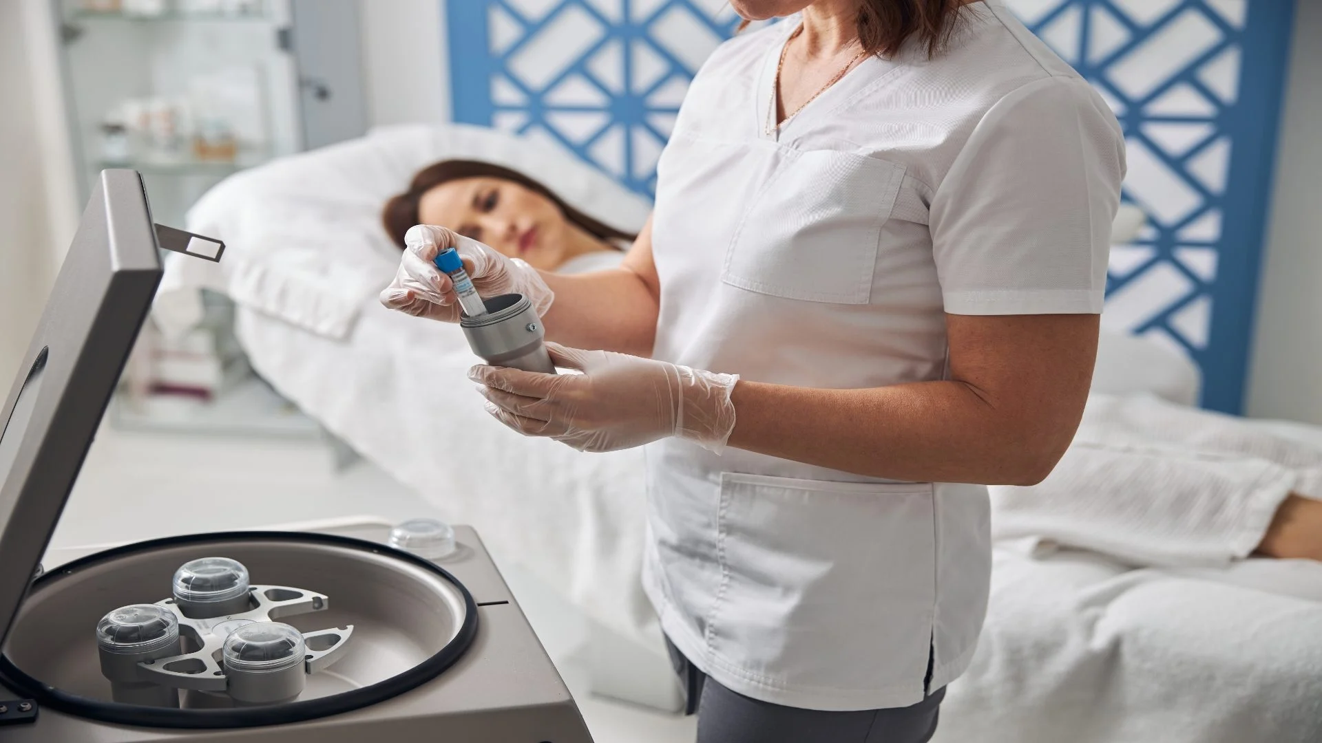 female-doctor-placing-test-tube-into-metal-contain-2025-03-09-08-02-03-utc