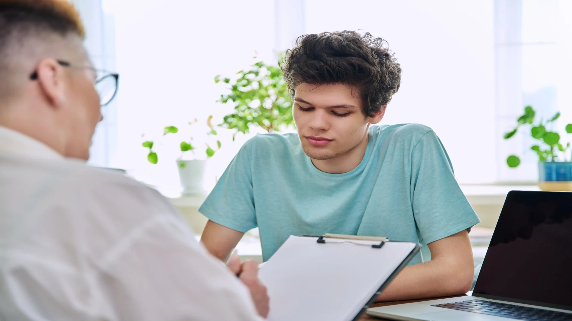 college-student-guy-at-meeting-with-professional-c-2024-12-08-05-23-04-utc