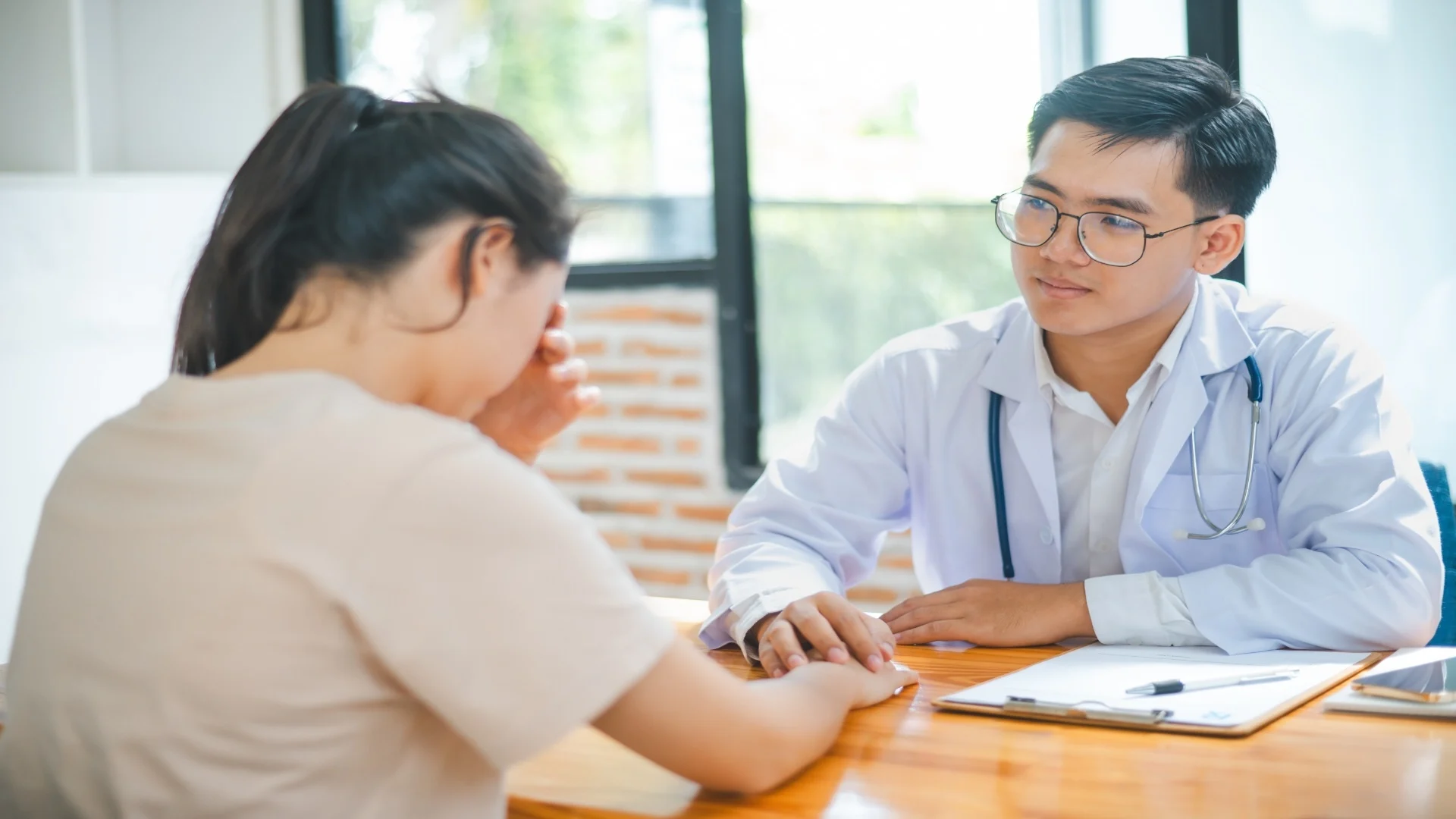 doctor-hand-holding-the-patient-s-hand-2025-02-15-08-46-28-utc