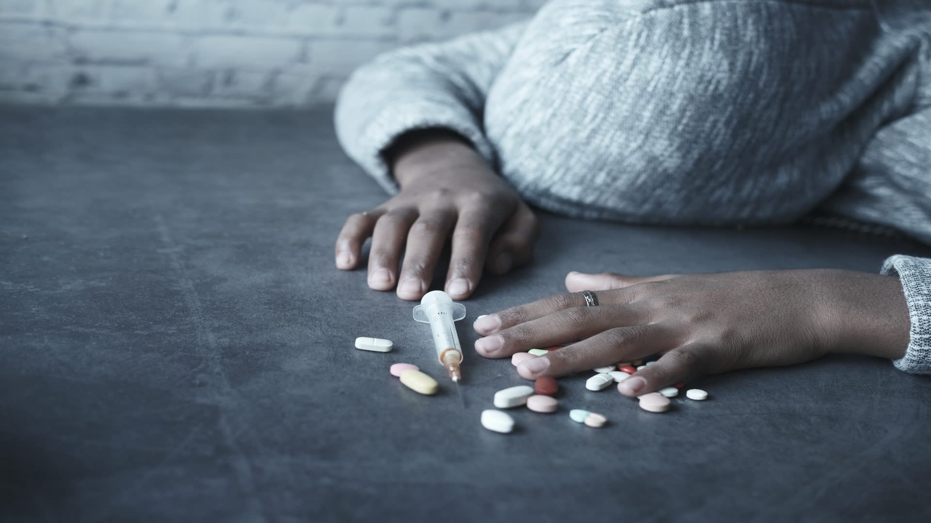 drug-addiction-concept-with-hand-holding-pills-and-2024-12-13-08-32-32-utc