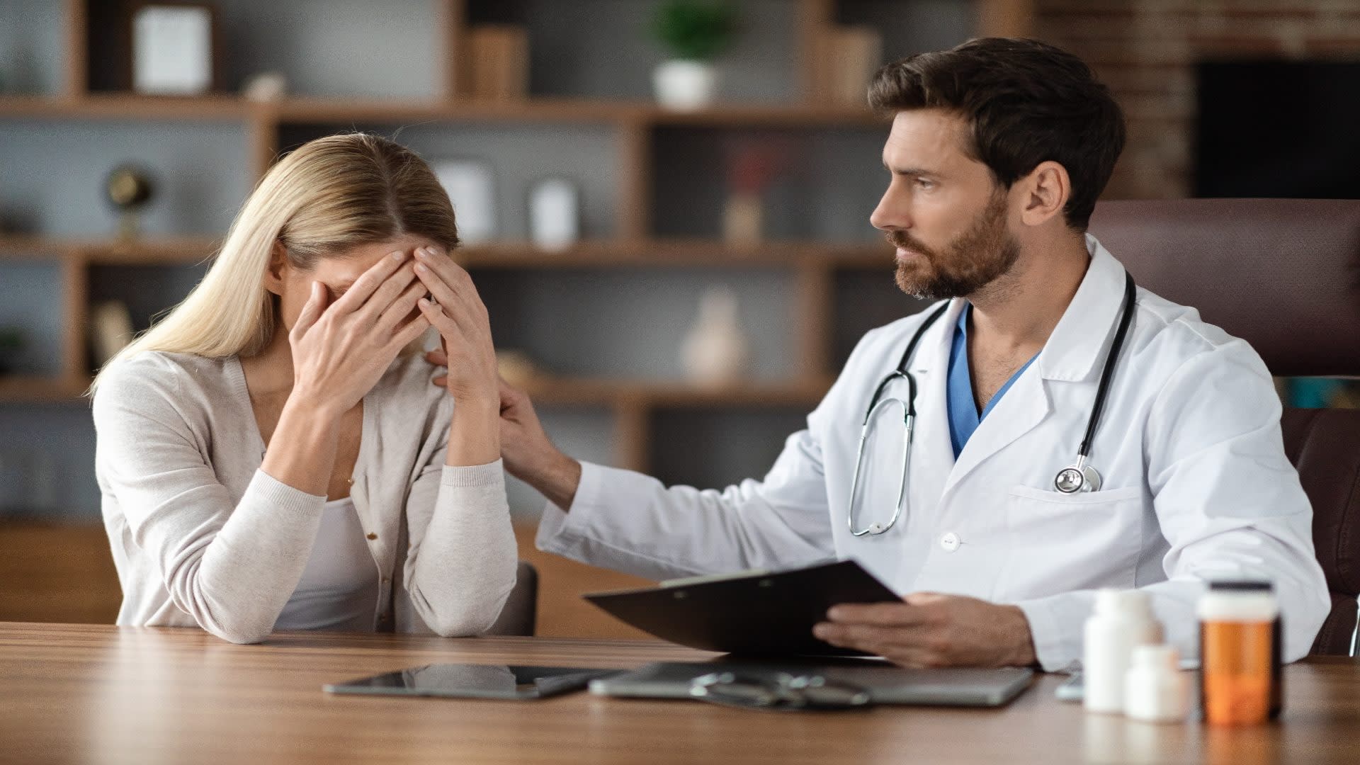 male-therapist-comforting-crying-young-woman-after-2025-03-28-09-56-08-utc