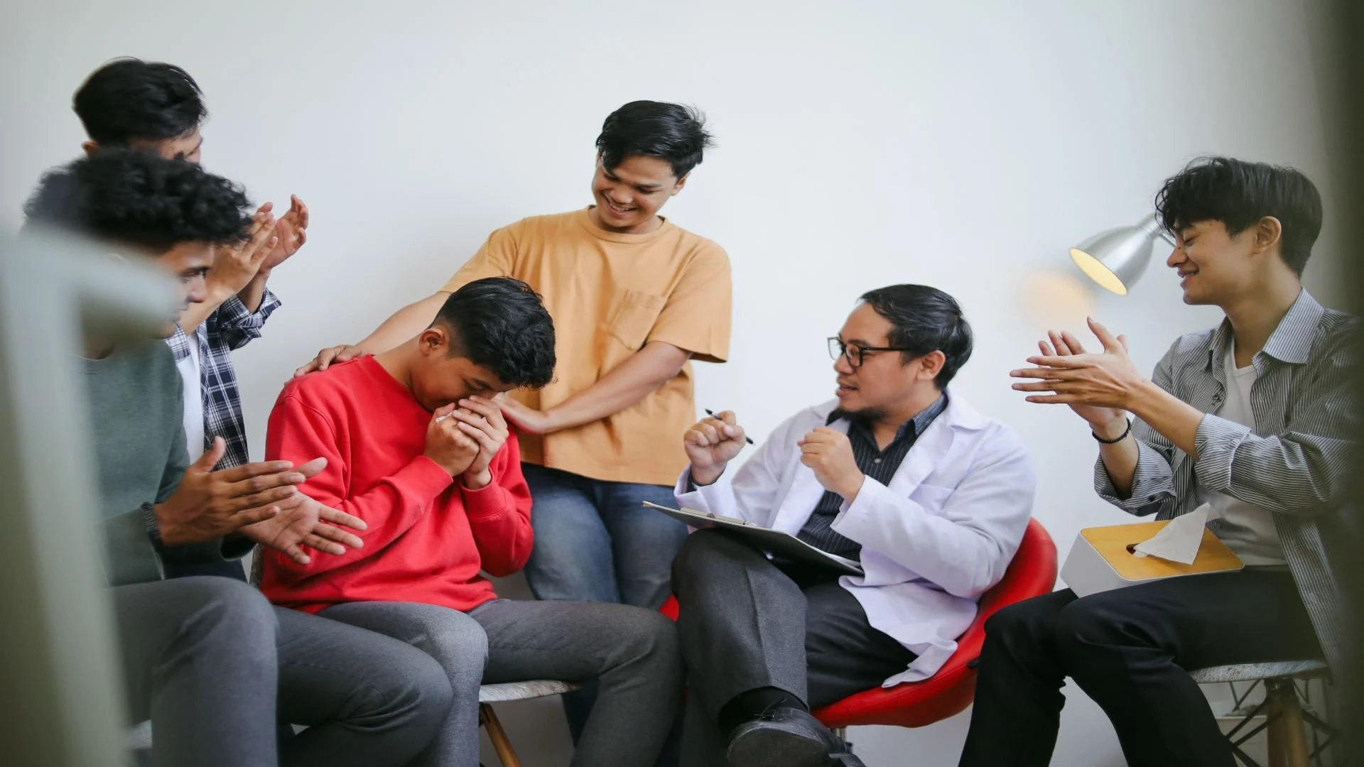 group-of-diverse-people-group-supporting-friend-du-2025-03-12-20-00-30-utc