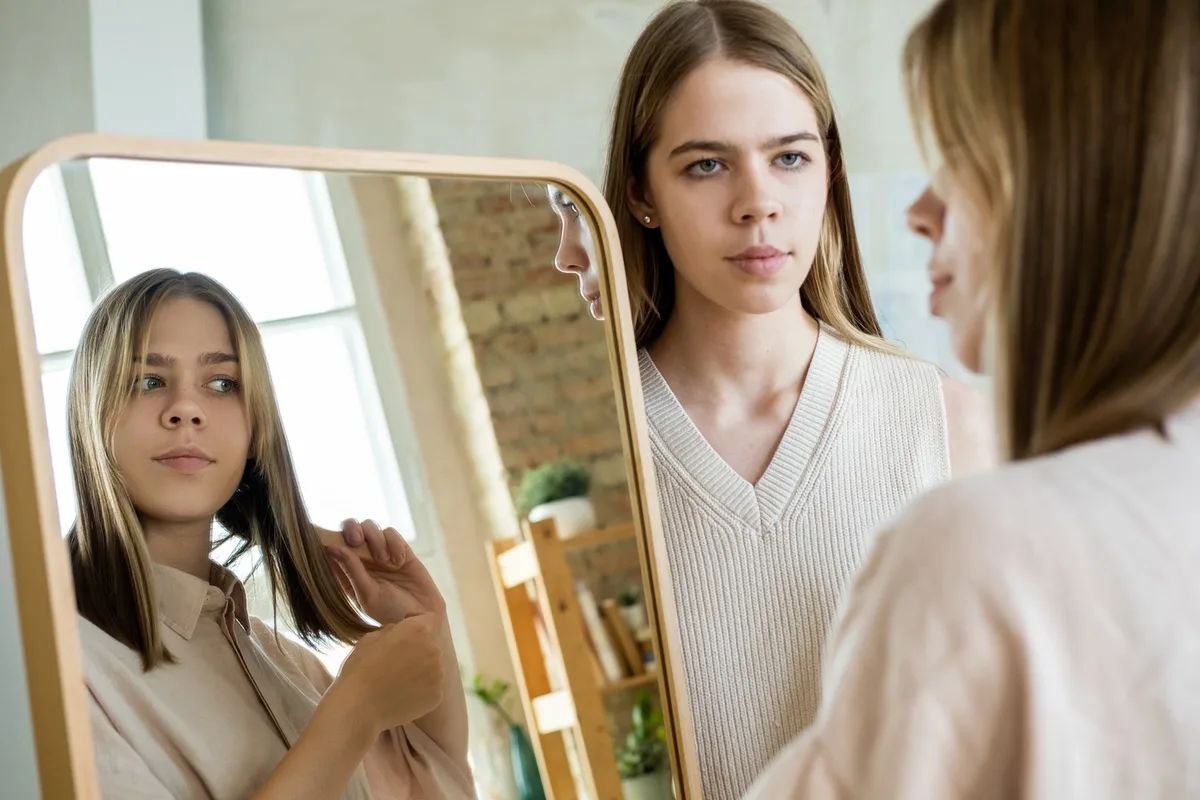 Woman with Narcissistic Personality Disorder Admiring Herself in the Mirror