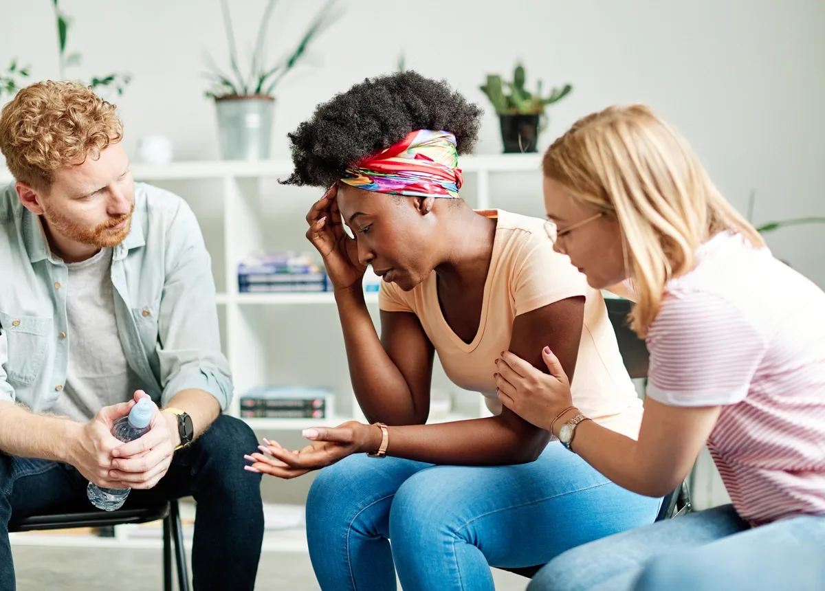 Xanax Addiction: Woman being consoled by friends