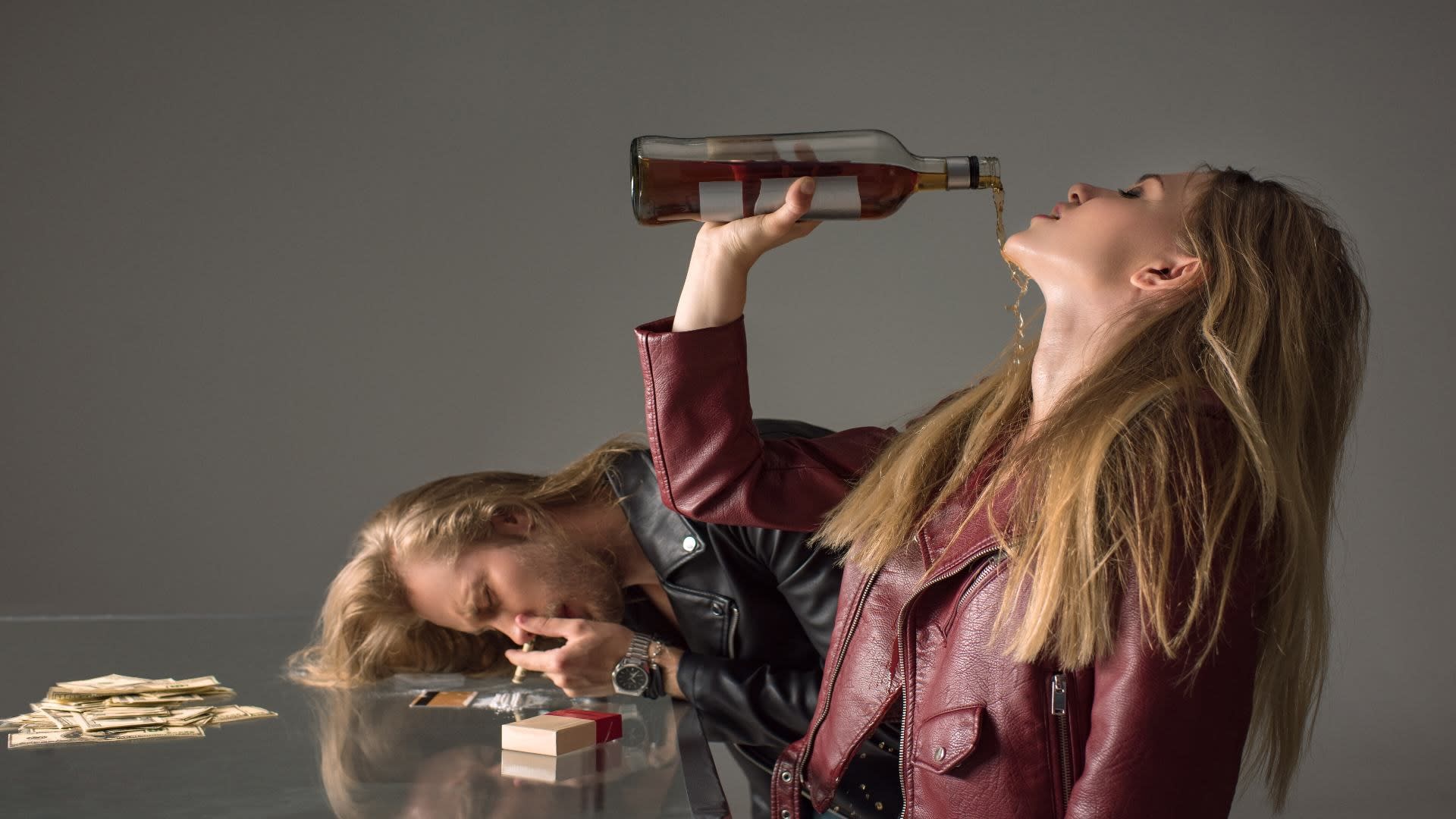 young-addicted-couple-drinking-alcohol-and-sniffin-2024-11-18-01-11-24-utc