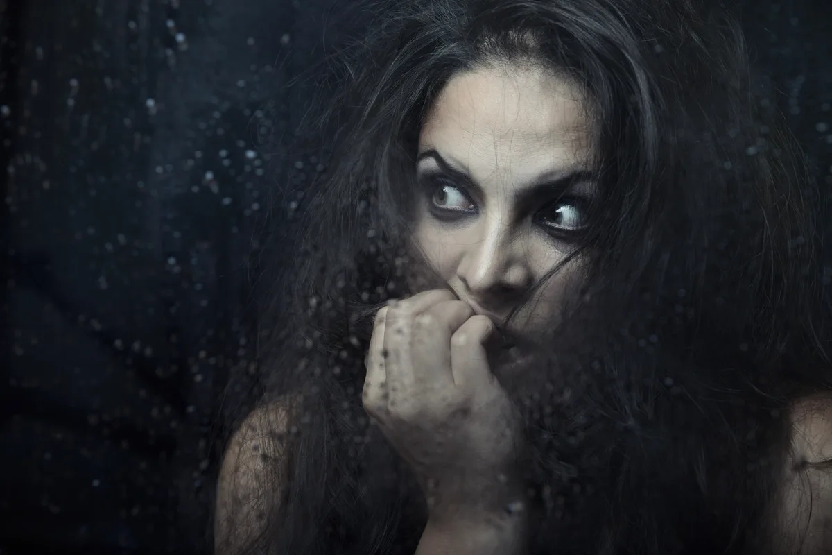 Fear in Her Eyes from Paranoid Schizophrenia