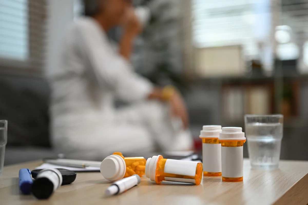 Prescription Drug Addiction: Close up of pill bottles on a table