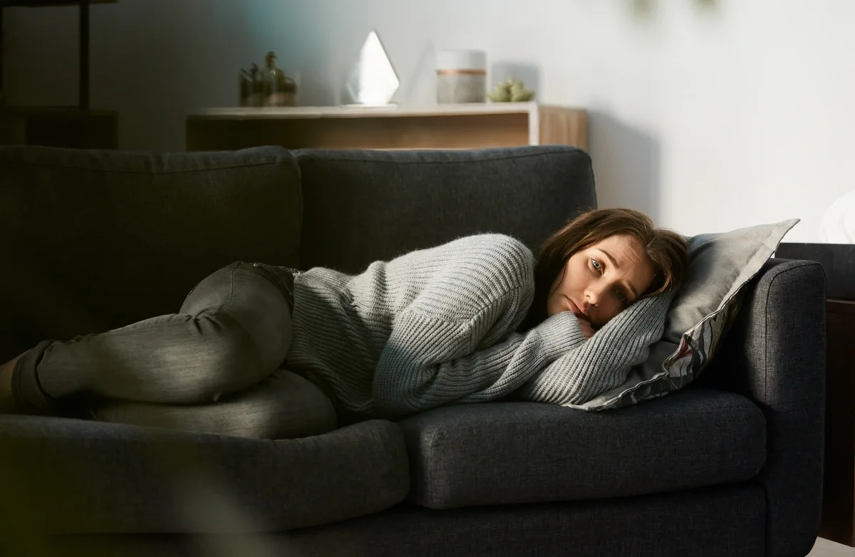 Persistent Depressive Disorder - Woman Laying on Couch Persistent Depressive Disorder - Woman Laying on Couch