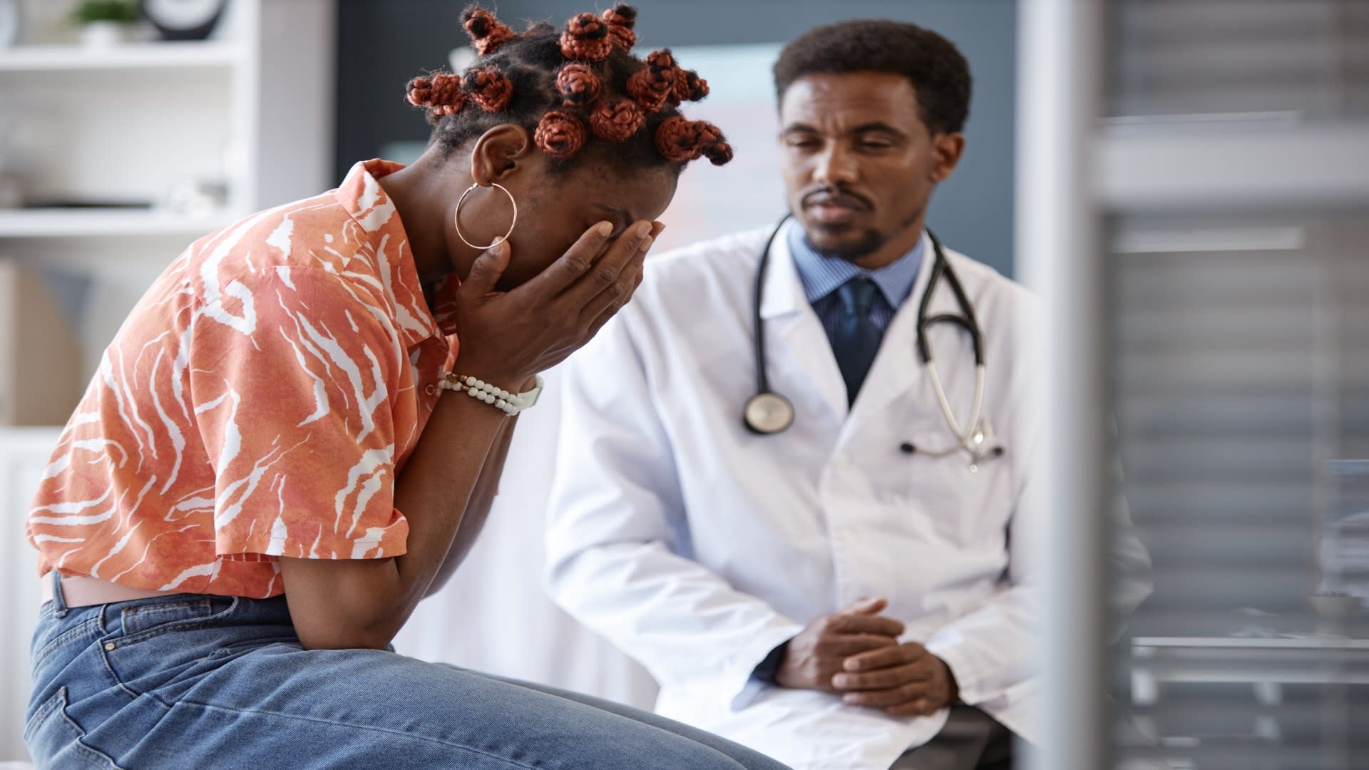 black-woman-crying-in-doctors-office-2025-03-09-19-27-14-utc