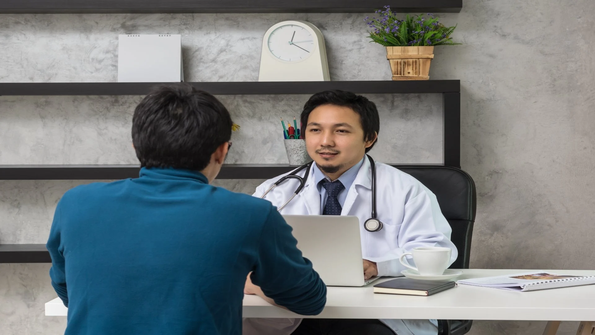 asian-male-doctor-discussing-diagnosis-with-patien-2024-10-21-01-52-24-utc