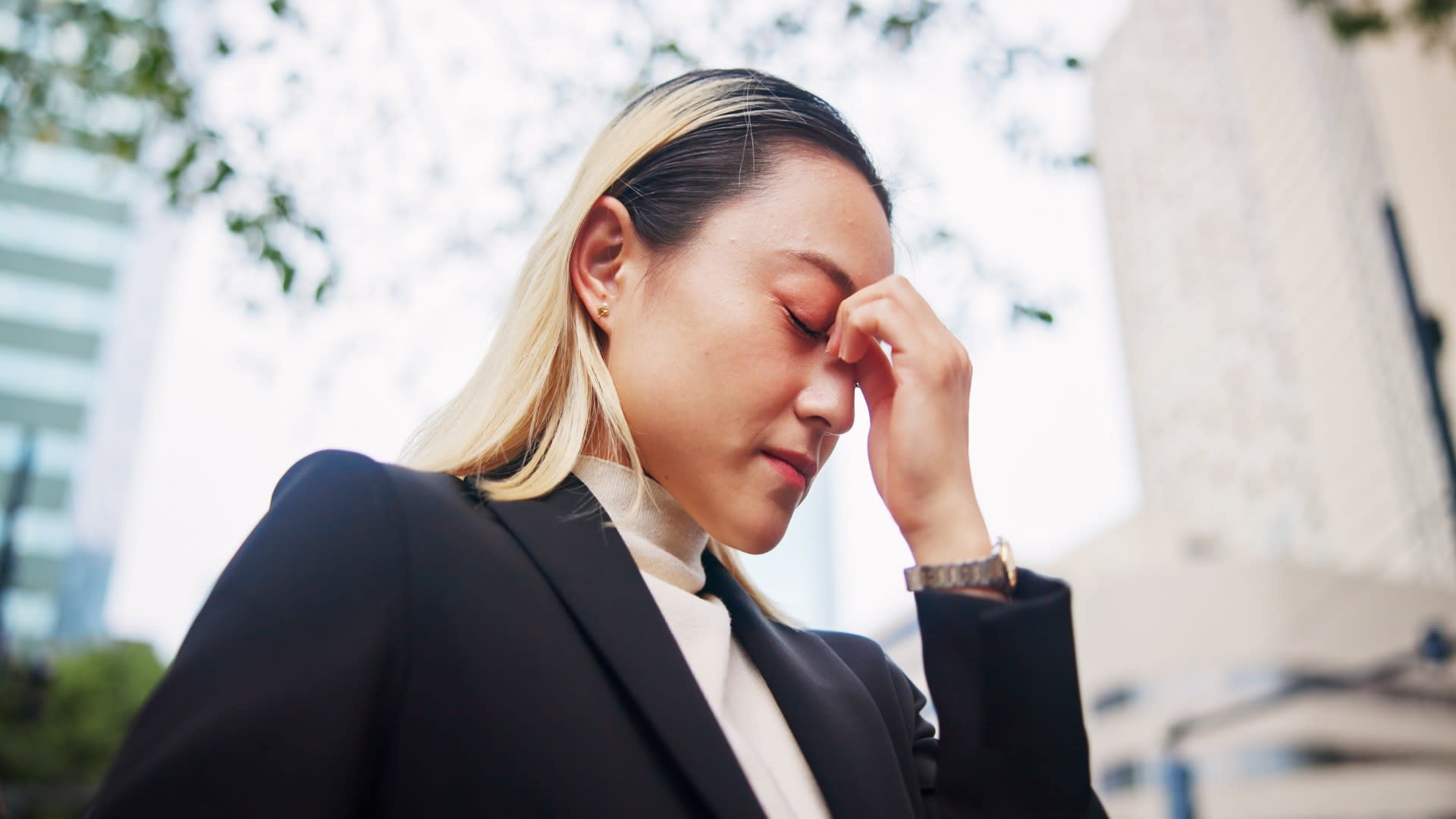 asian-woman-headache-or-strain-with-stress-in-cit-2025-04-06-11-29-42-utc