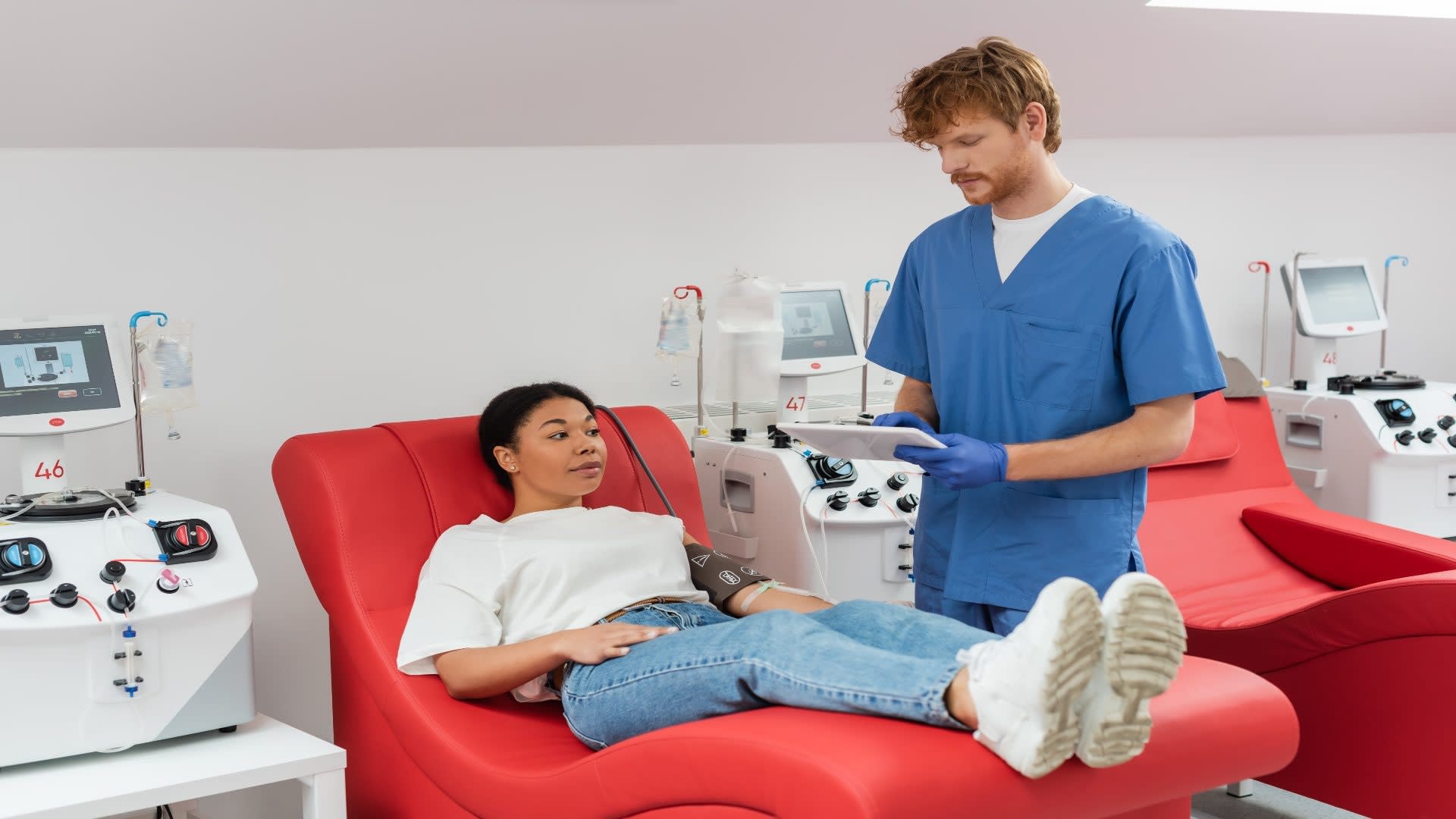 redhead-doctor-in-blue-uniform-and-latex-gloves-us-2025-04-06-01-30-24-utc
