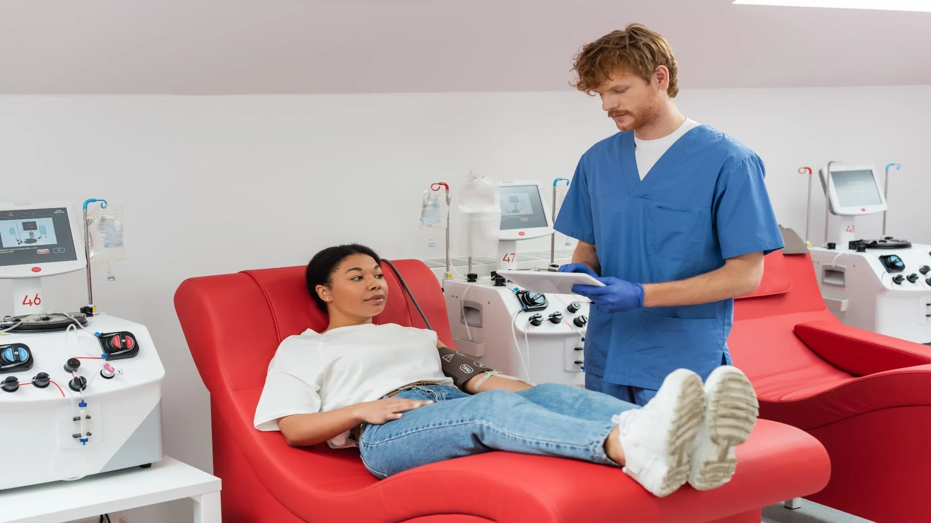 redhead-doctor-in-blue-uniform-and-latex-gloves-us-2025-04-06-01-30-24-utc