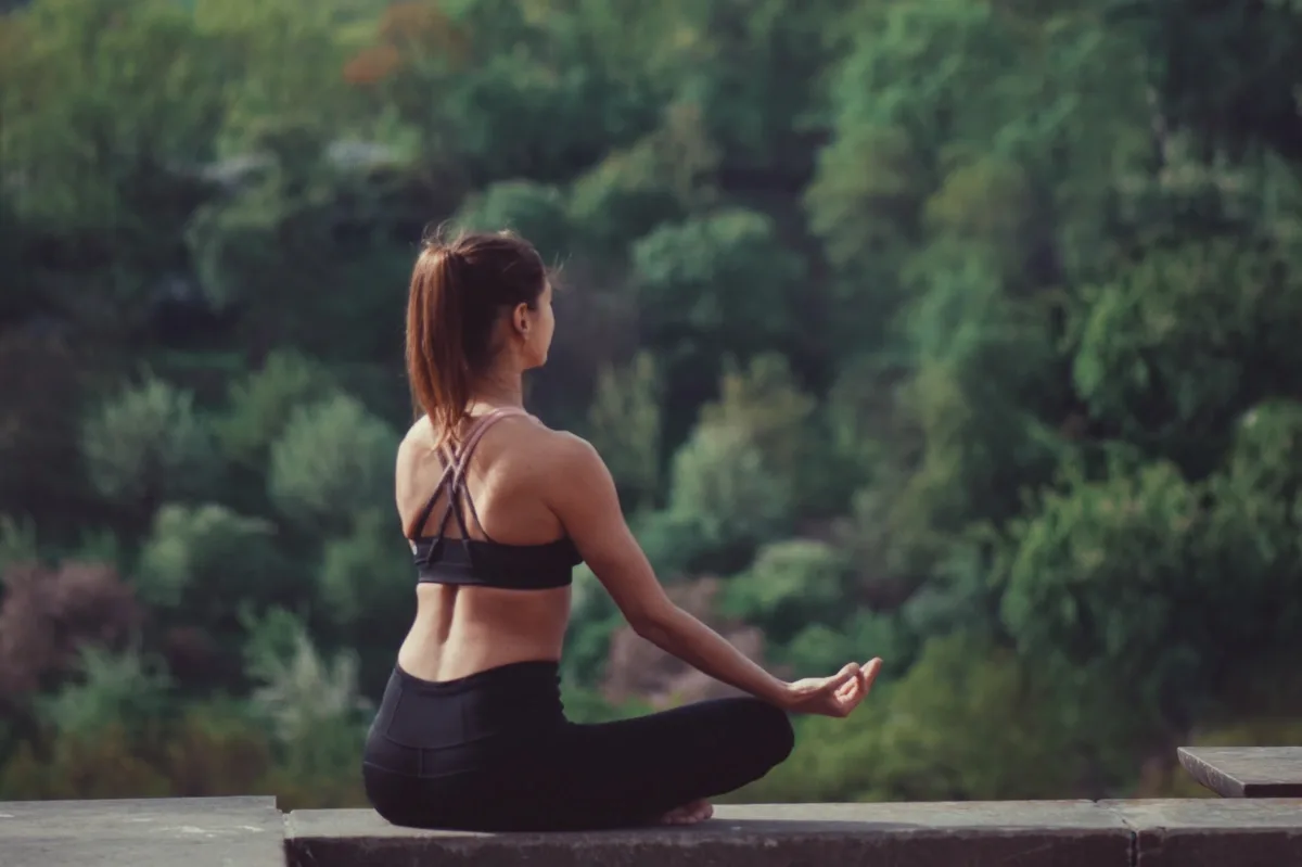 Drug Detox: Woman sitting and relaxing doing yoga