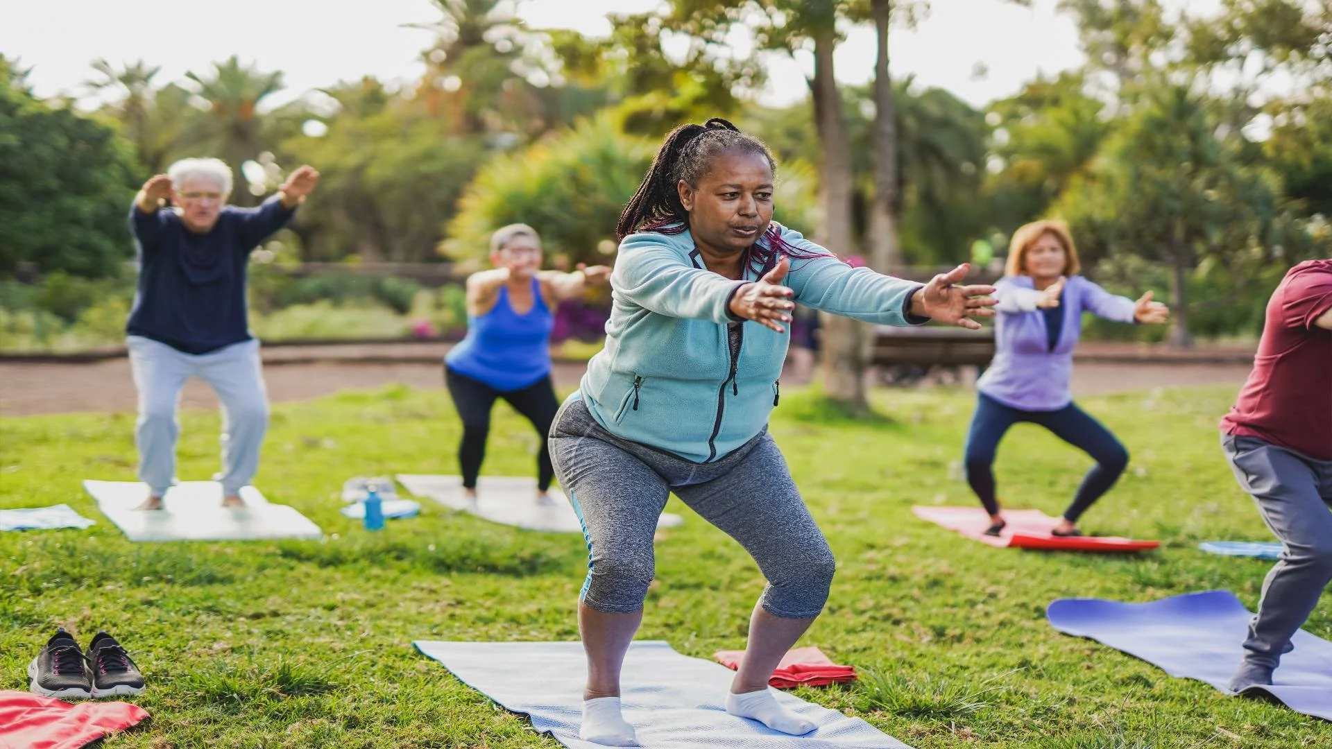 fit-multiracial-senior-people-doing-yoga-exercise-2025-03-10-10-39-13-utc