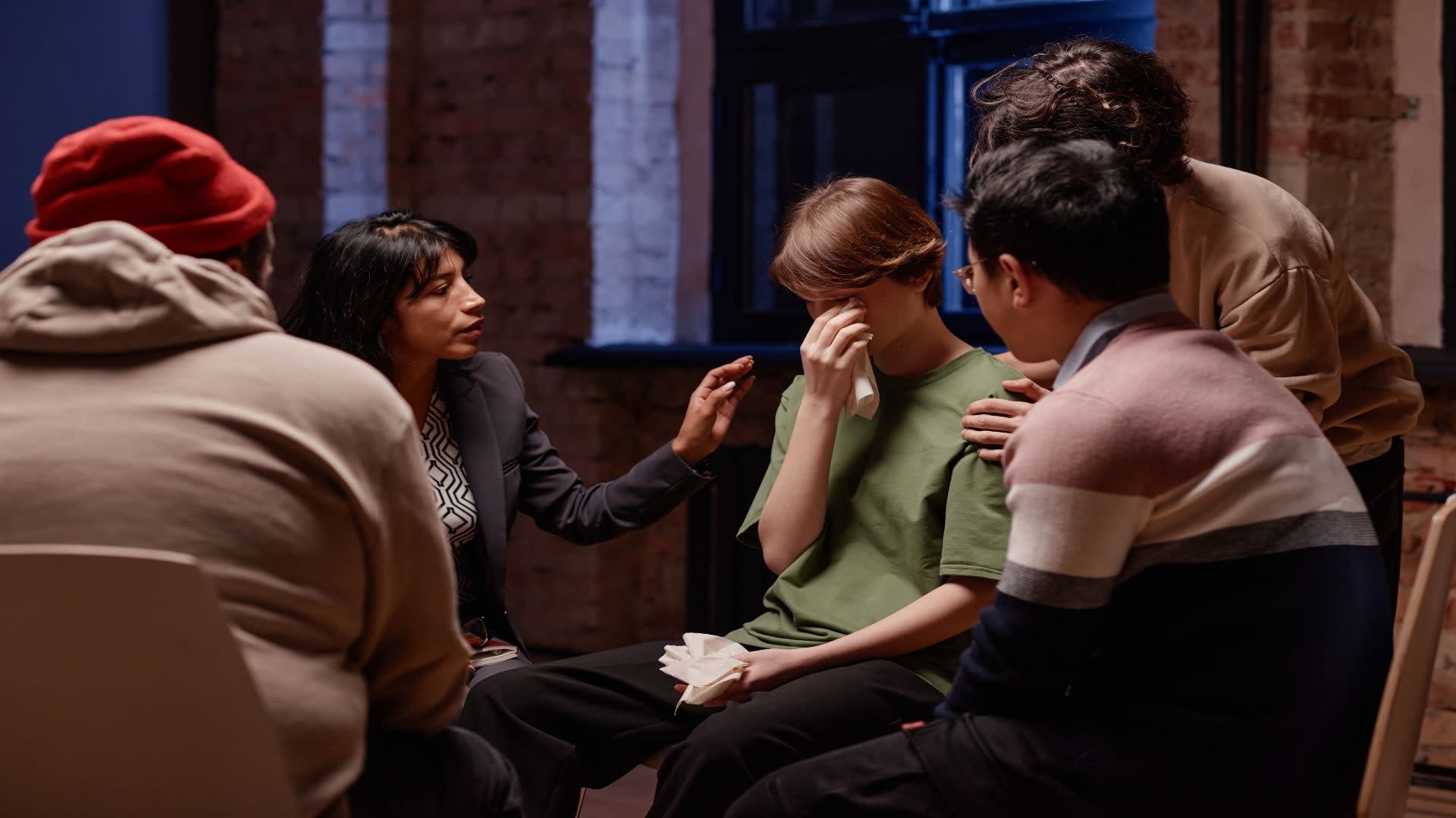 comforting-woman-during-psychotherapy-2025-03-18-22-09-16-utc