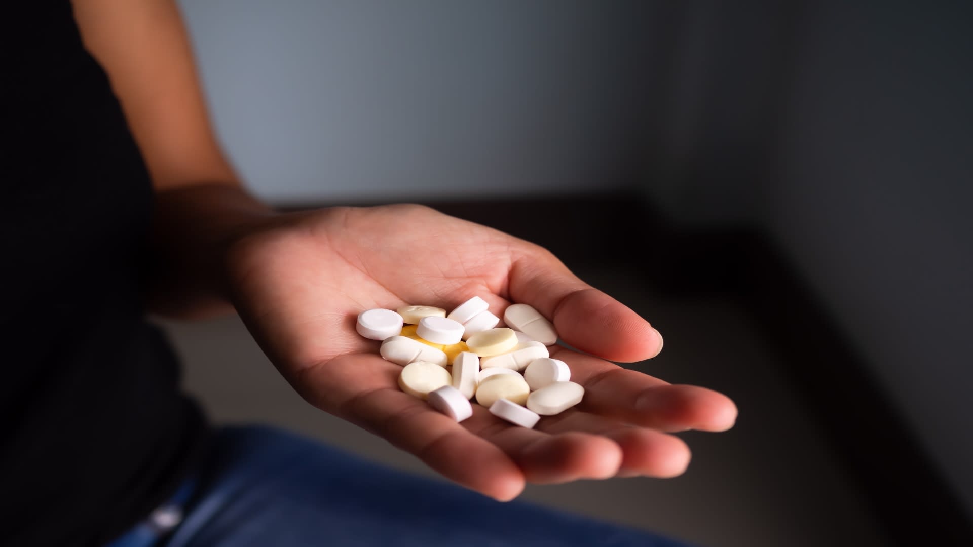 drug-on-palm-woman-on-dark-black-background-2025-02-21-08-40-38-utc