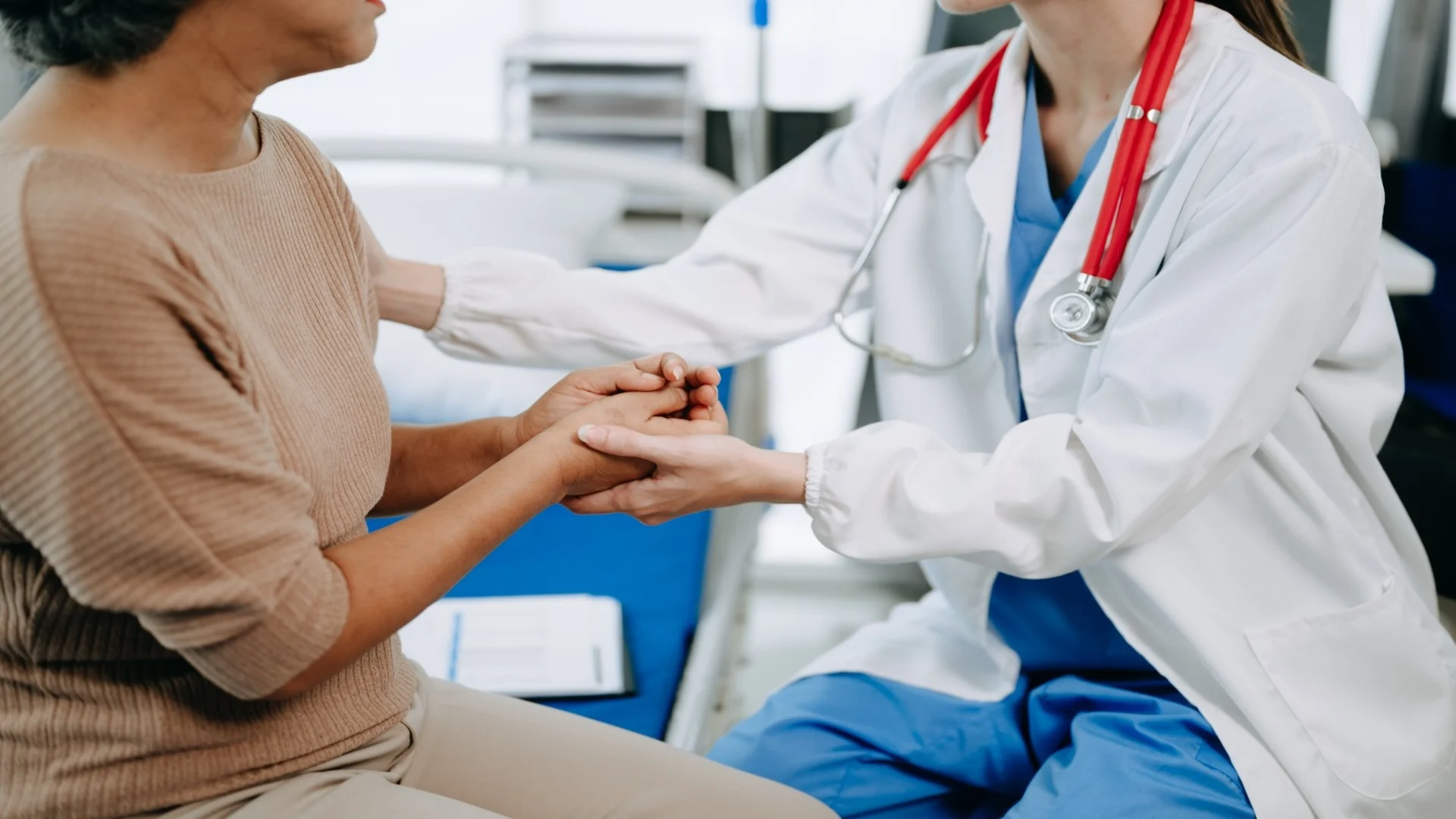 doctor-and-senior-female-patient-who-lie-on-the-b-2025-05-07-18-42-11-utc