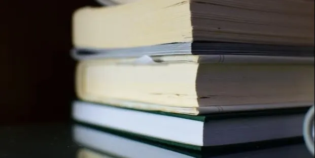 stack of books. Photo by Mahendra Kumar on Unsplash