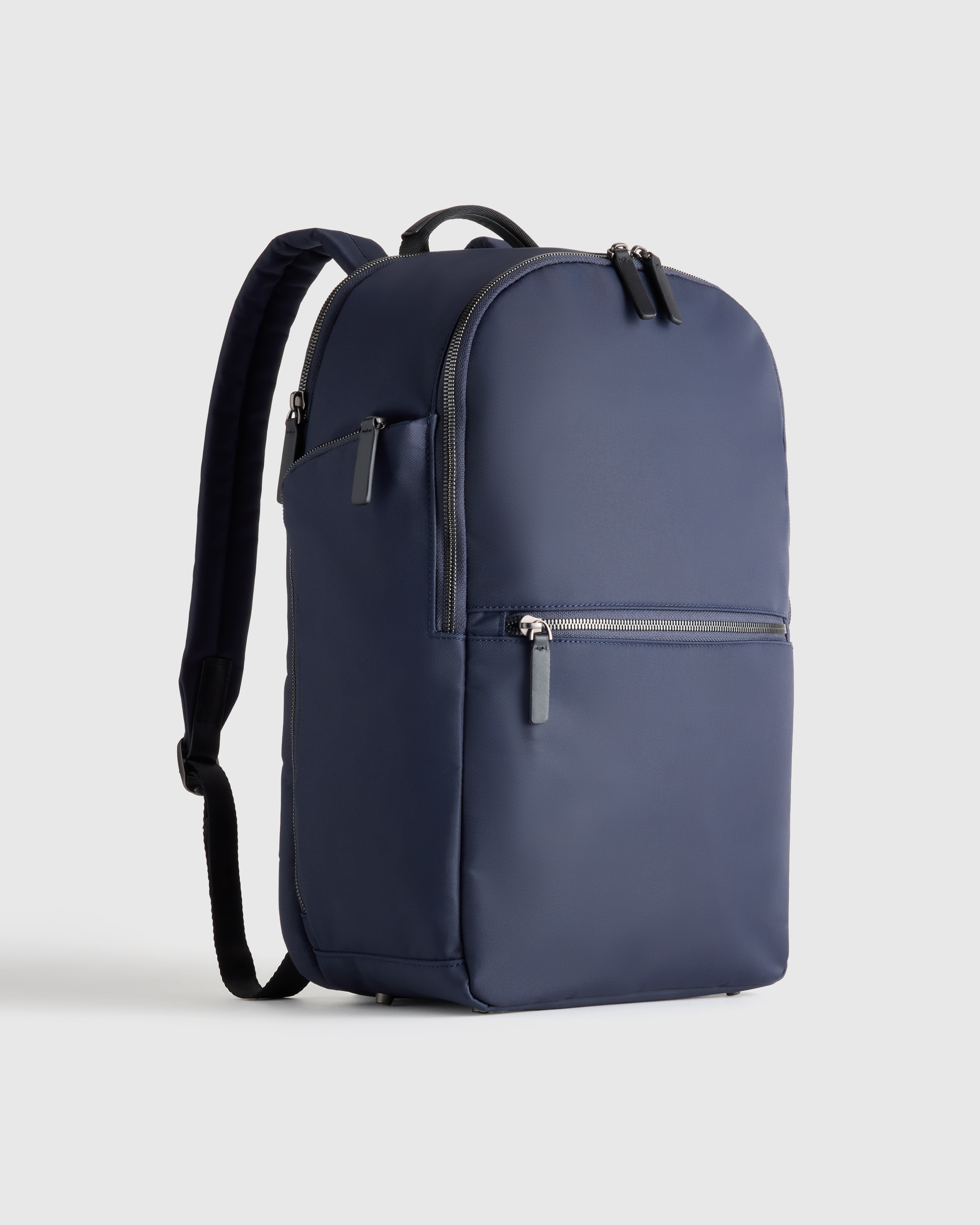 Voyage Nylon Slim Travel Backpack in Navy | Quince Canada