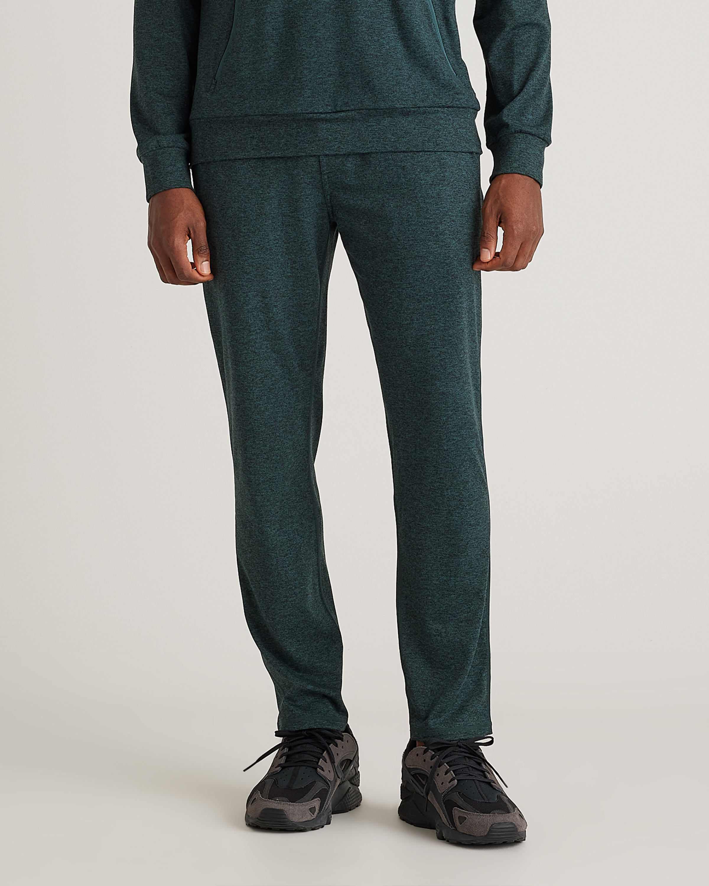 Shop Quince Men's Super Soft Performance Pants In Heather Green