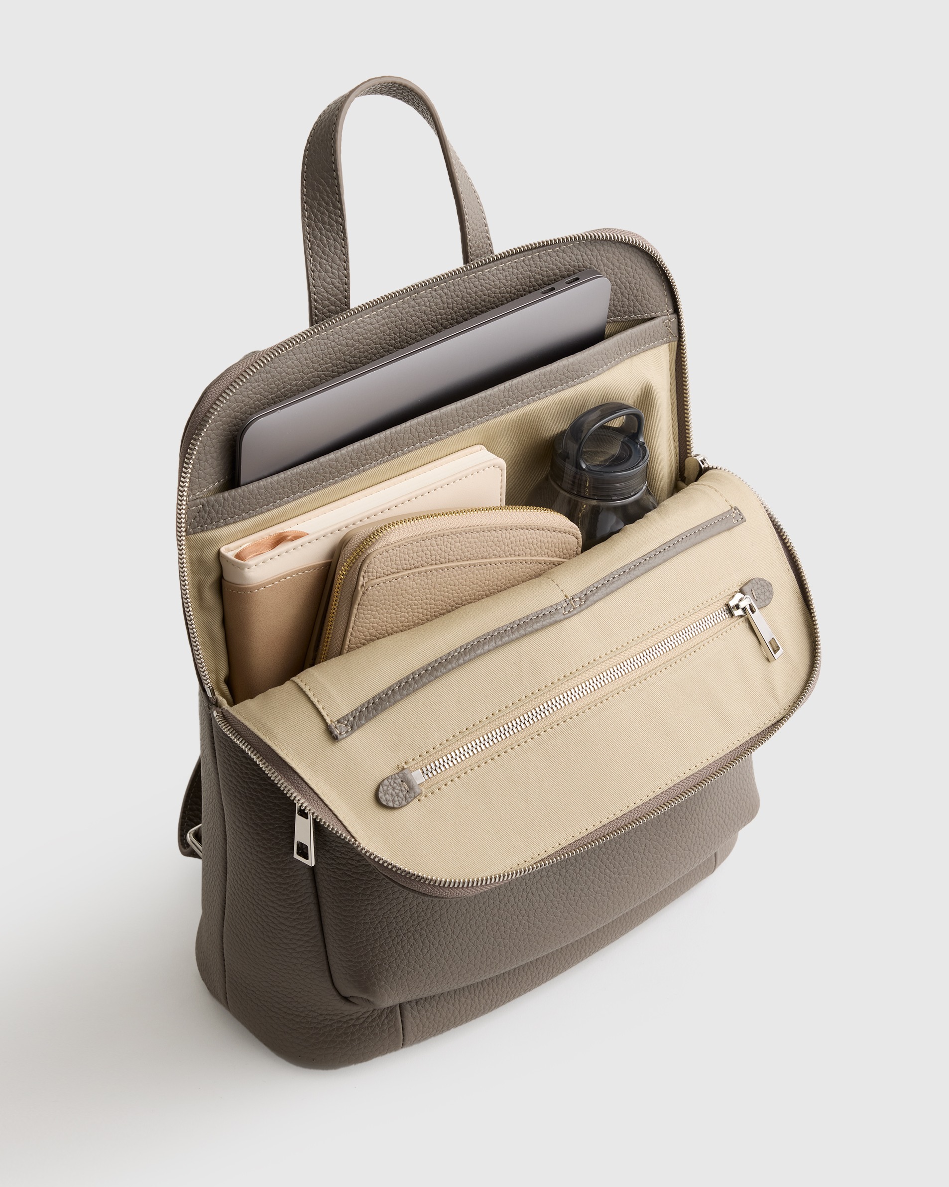 amerileather quince leather convertible backpack Urban Buckle Flap Backpack; Dark Brown One zippered interior pocket with a key ring Italian Leather Convertible Backpack in