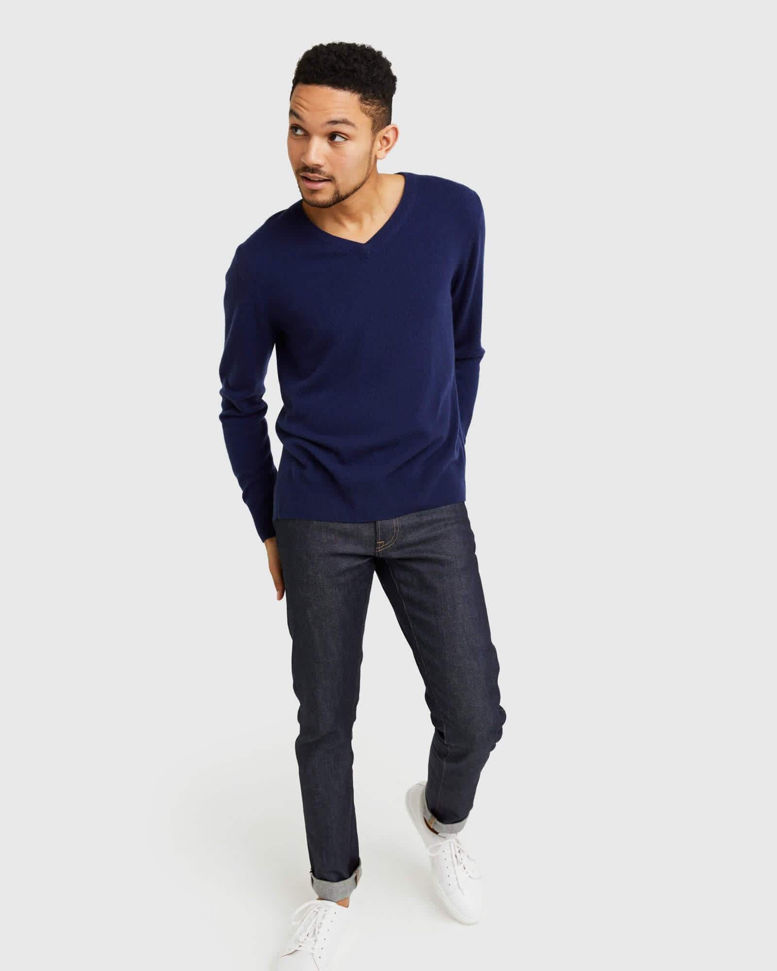 Man wearing navy cashmere v-neck sweater for men walking