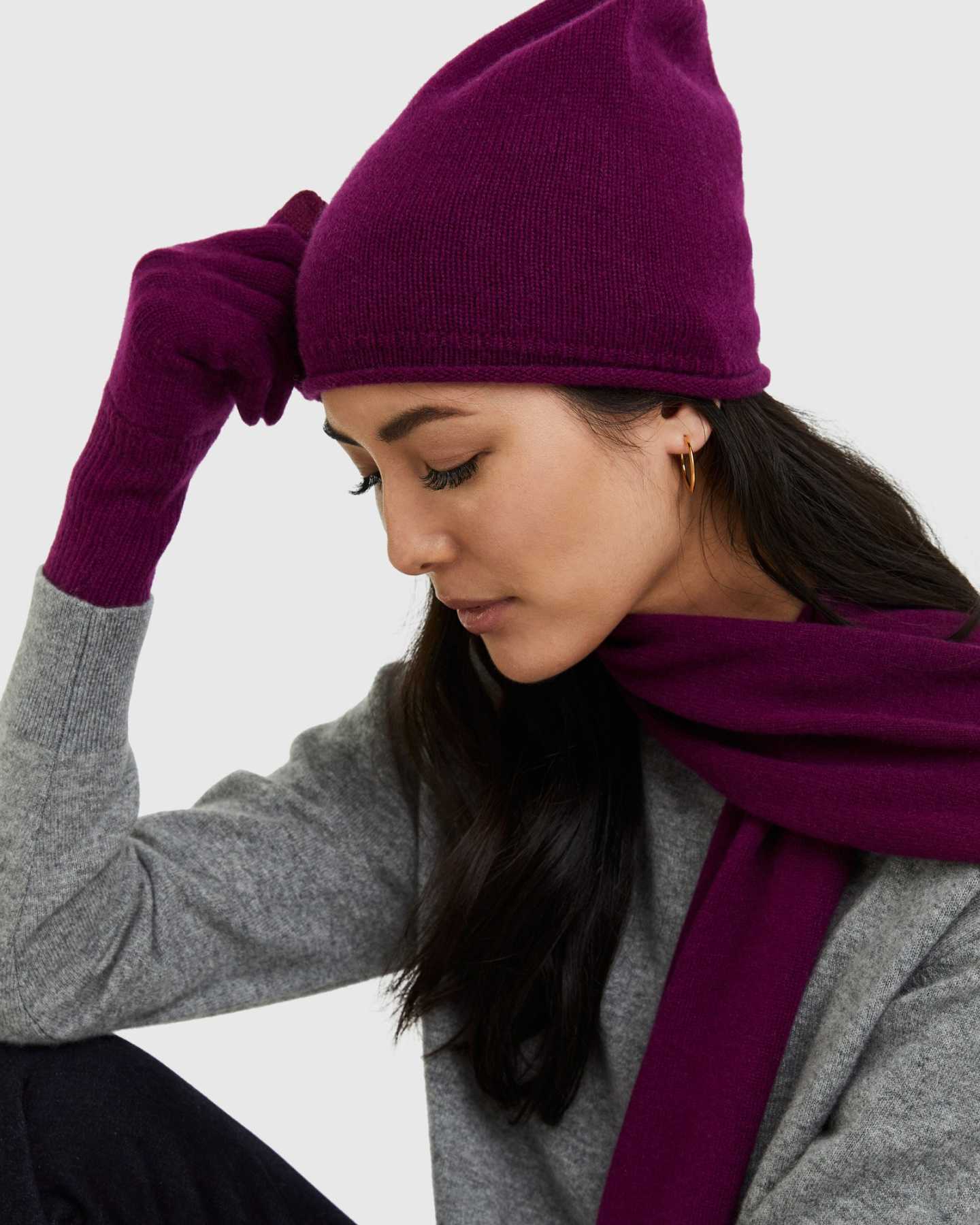 woman wearing red cashmere slouchy beanie