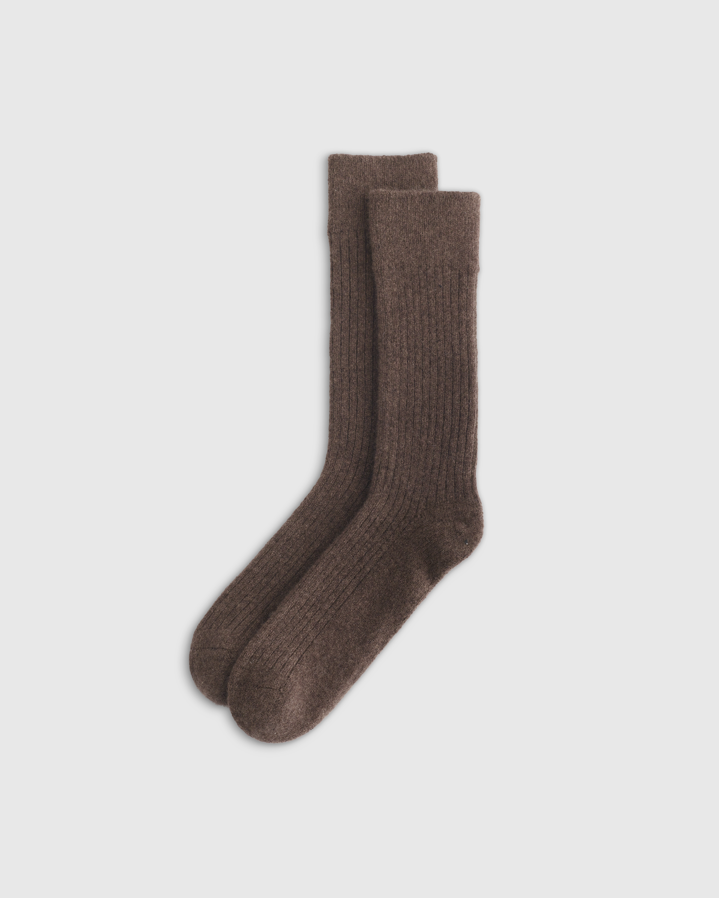 Cashmere Trouser Sock $30 
they don't shrink in the dryer, not too bulky to wear with regular shoes, insanely warm 