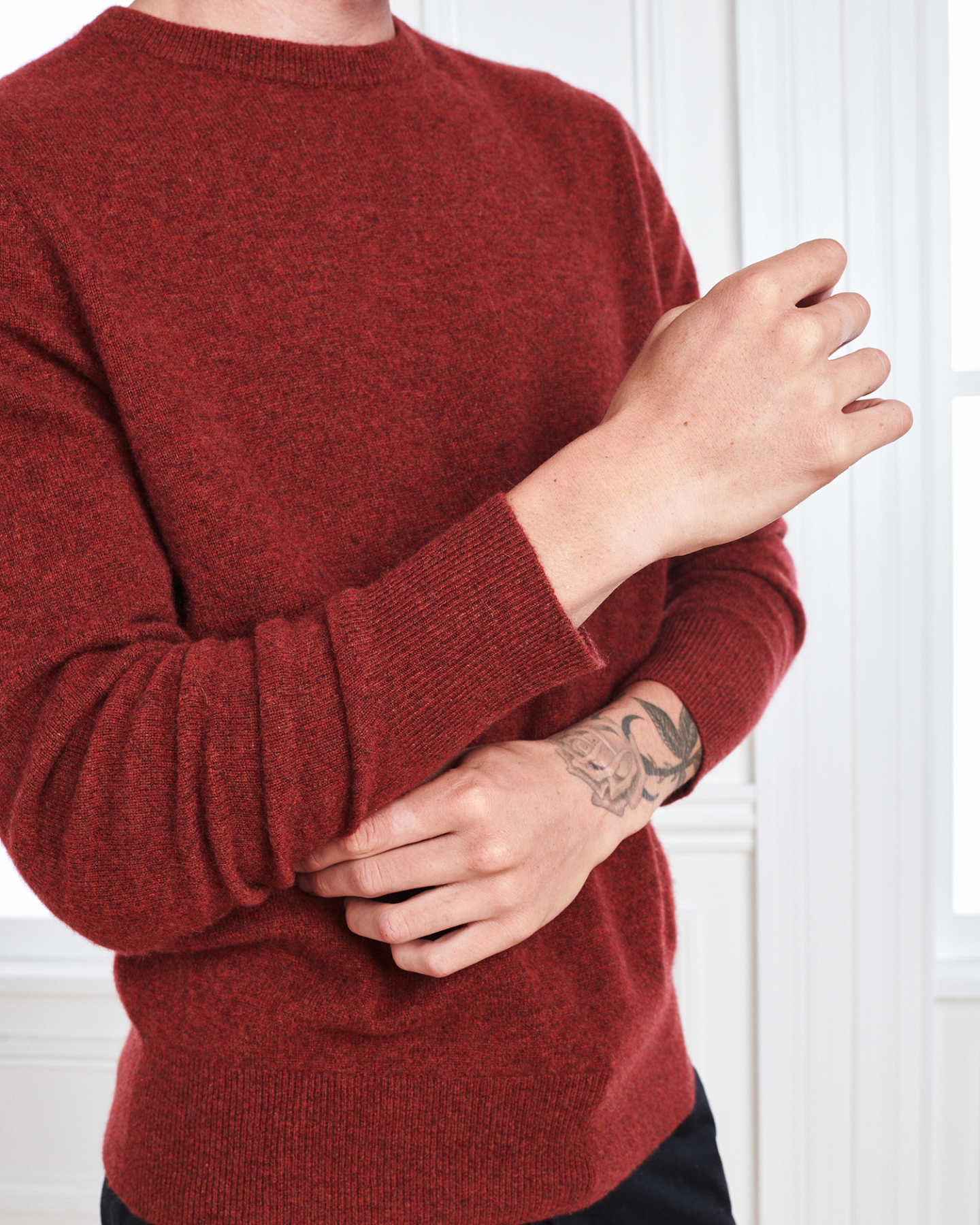 Man wearing red men's cashmere sweater zoomed