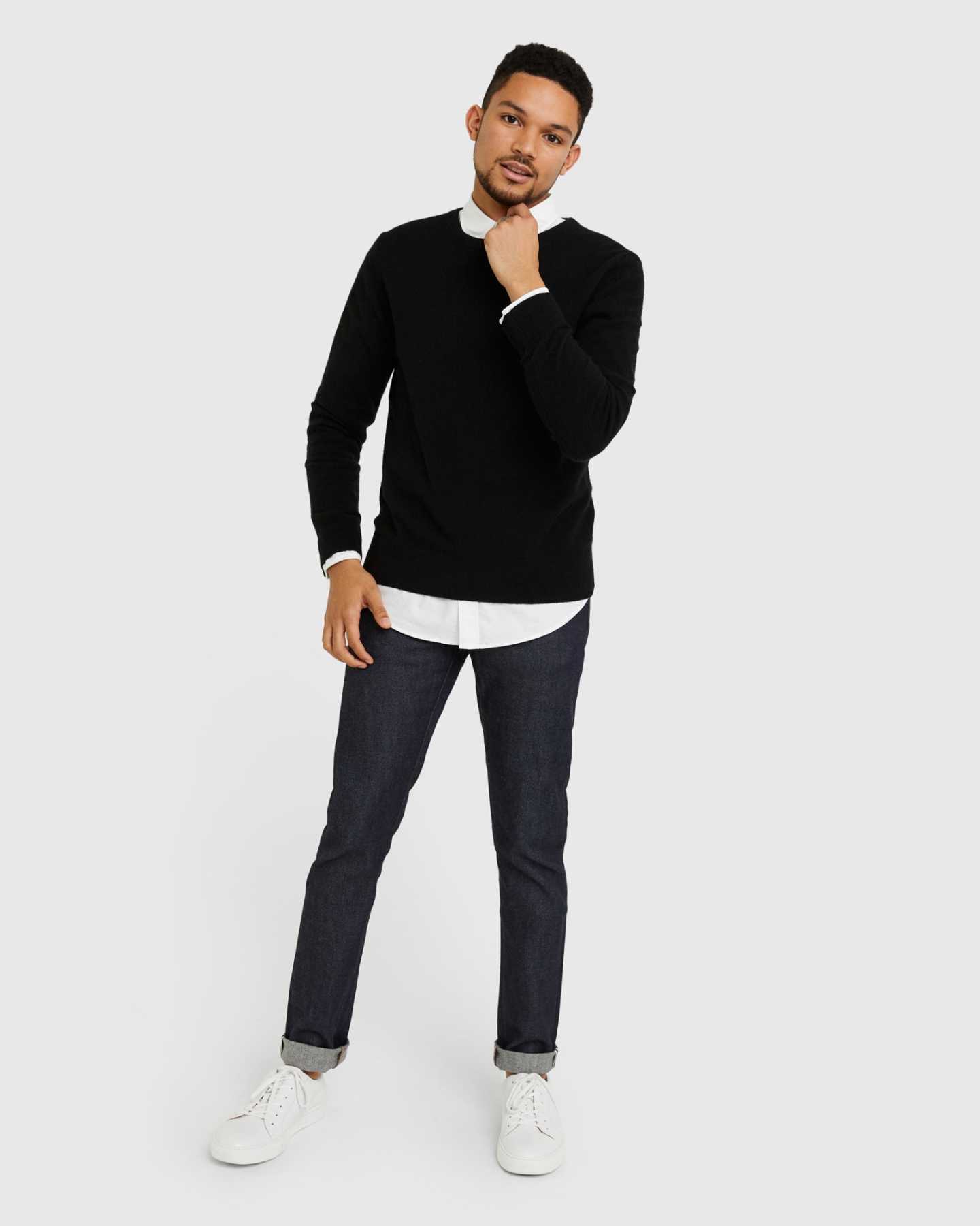 Man wearing black men's cashmere sweater from distance