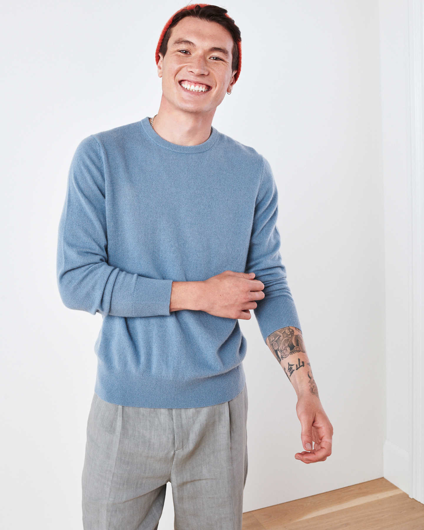 Man wearing light blue men's cashmere sweater