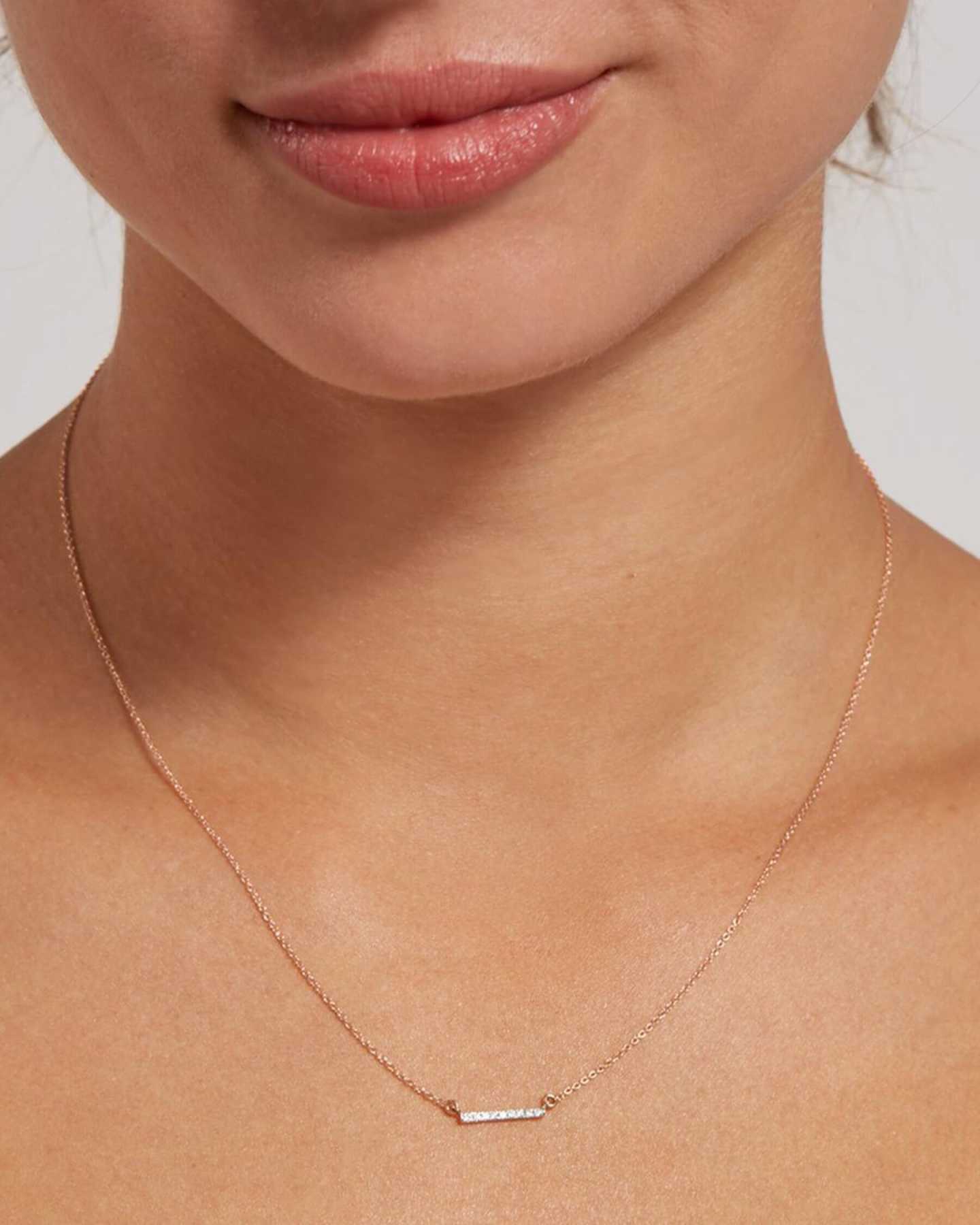 diamond bar necklace in rose gold on model