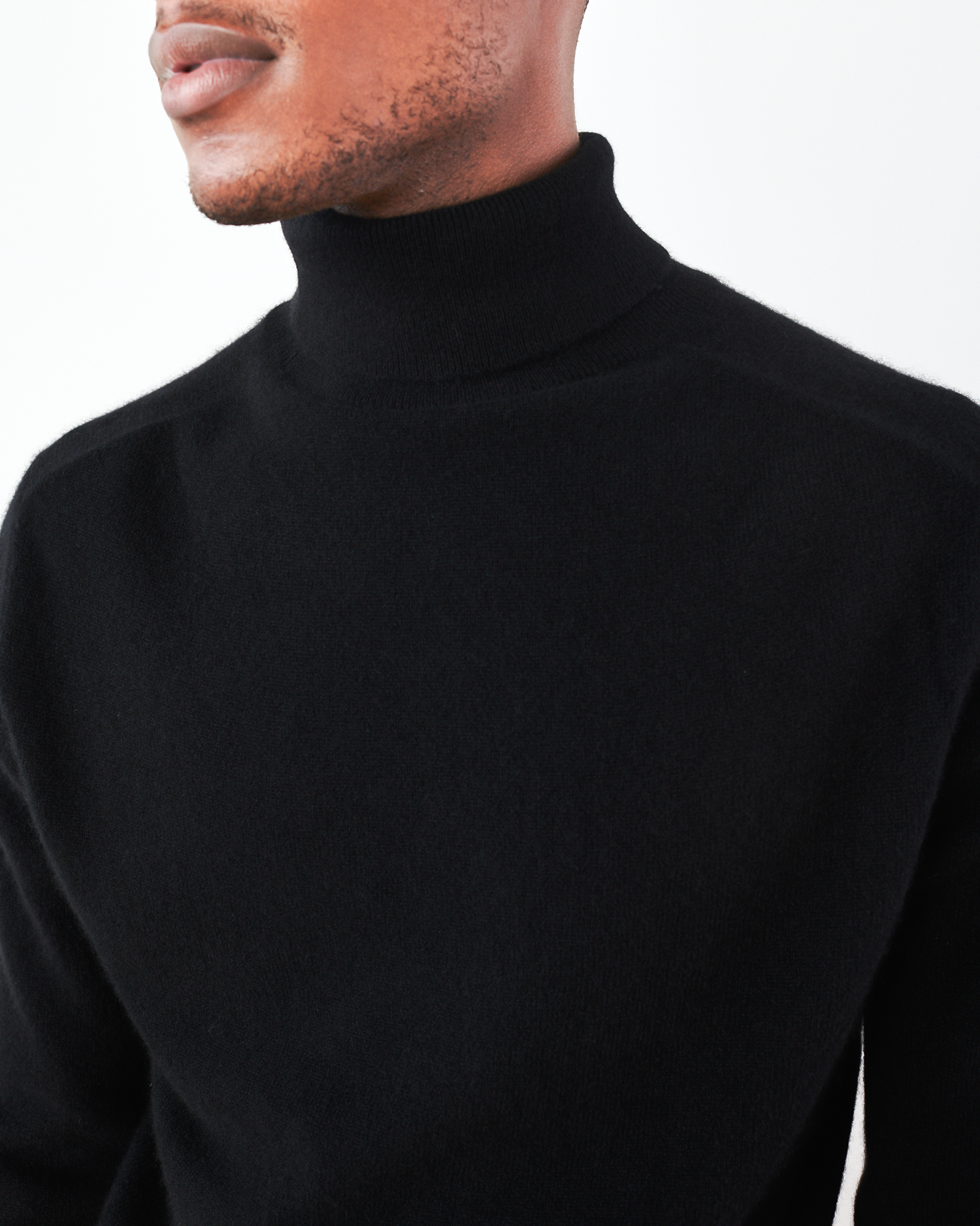 guy in black turtleneck