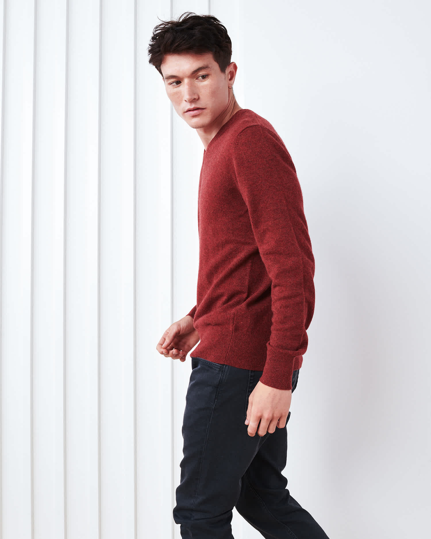 Man wearing red cashmere v-neck sweater for men walking